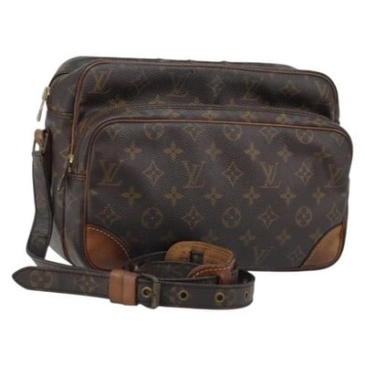 Louis Vuitton M45244 Nile Monogram Canvas Shoulder Bag: Louis Vuitton M45244 Nile Monogram Canvas Shoulder Bag Louis Vuitton Nile shoulder bag in Monogram canvas. This France-made bag includes the item only; box and dust bag are not included. It shows heav