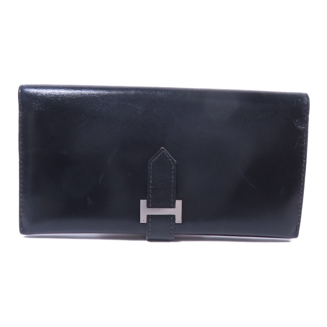 HERMES Bearn Long Wallet Black Boxcalf Leather PHW: HERMES Bearn Long Wallet Black Boxcalf Leather PHW This HERMES Bearn Long Wallet is crafted from premium boxcalf leather in a sophisticated Noir (black) color. Designed as a bifold purse, it offers bo