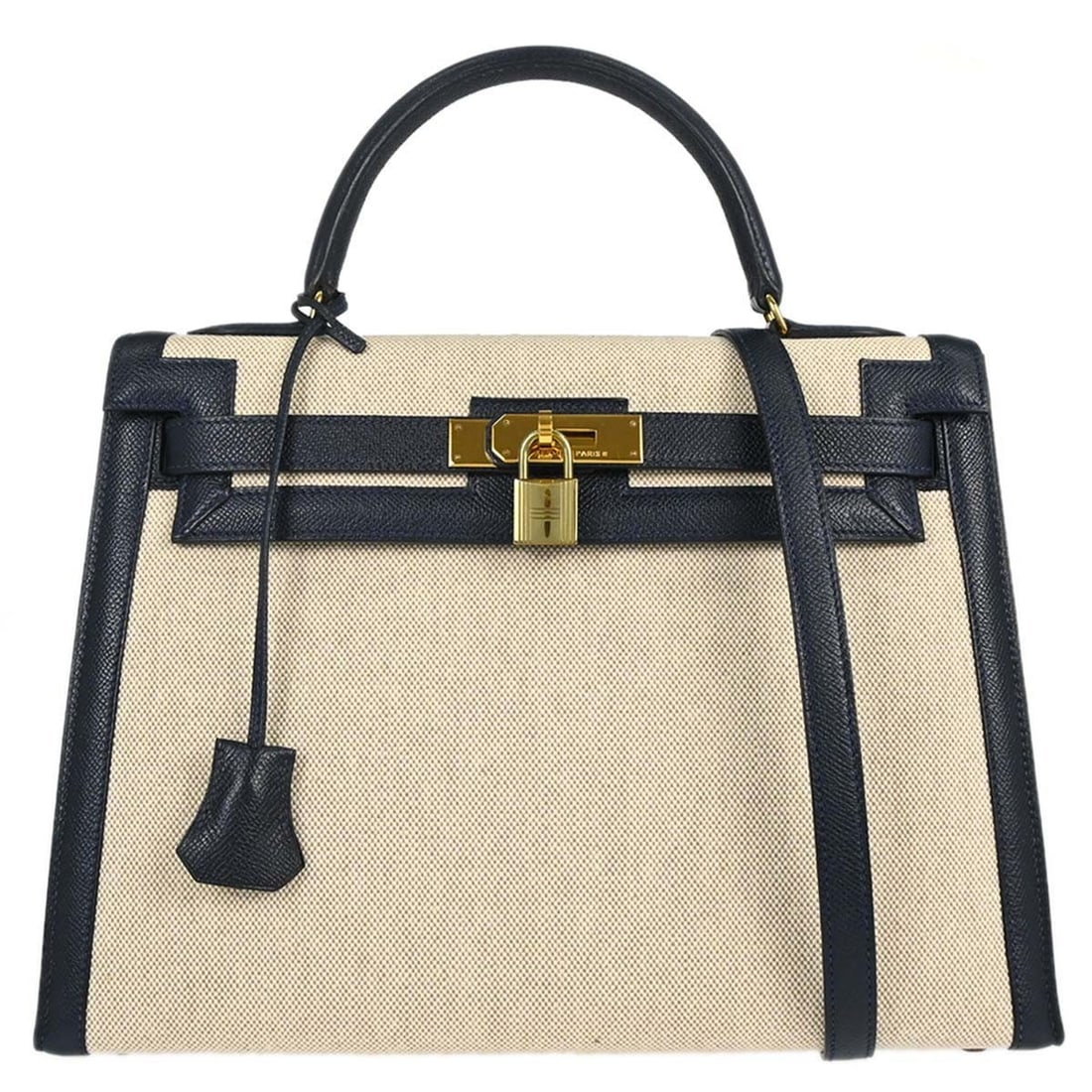 Hermes Kelly 32 Sellier 2way Handbag Blue Indigo Courchevel Toile H: Hermes Kelly 32 Sellier 2way Handbag Blue Indigo Courchevel Toile H Hermes Kelly 32 Sellier 2-way handbag in Blue Indigo Courchevel leather and Beige Toile H. This structured top handle design feature