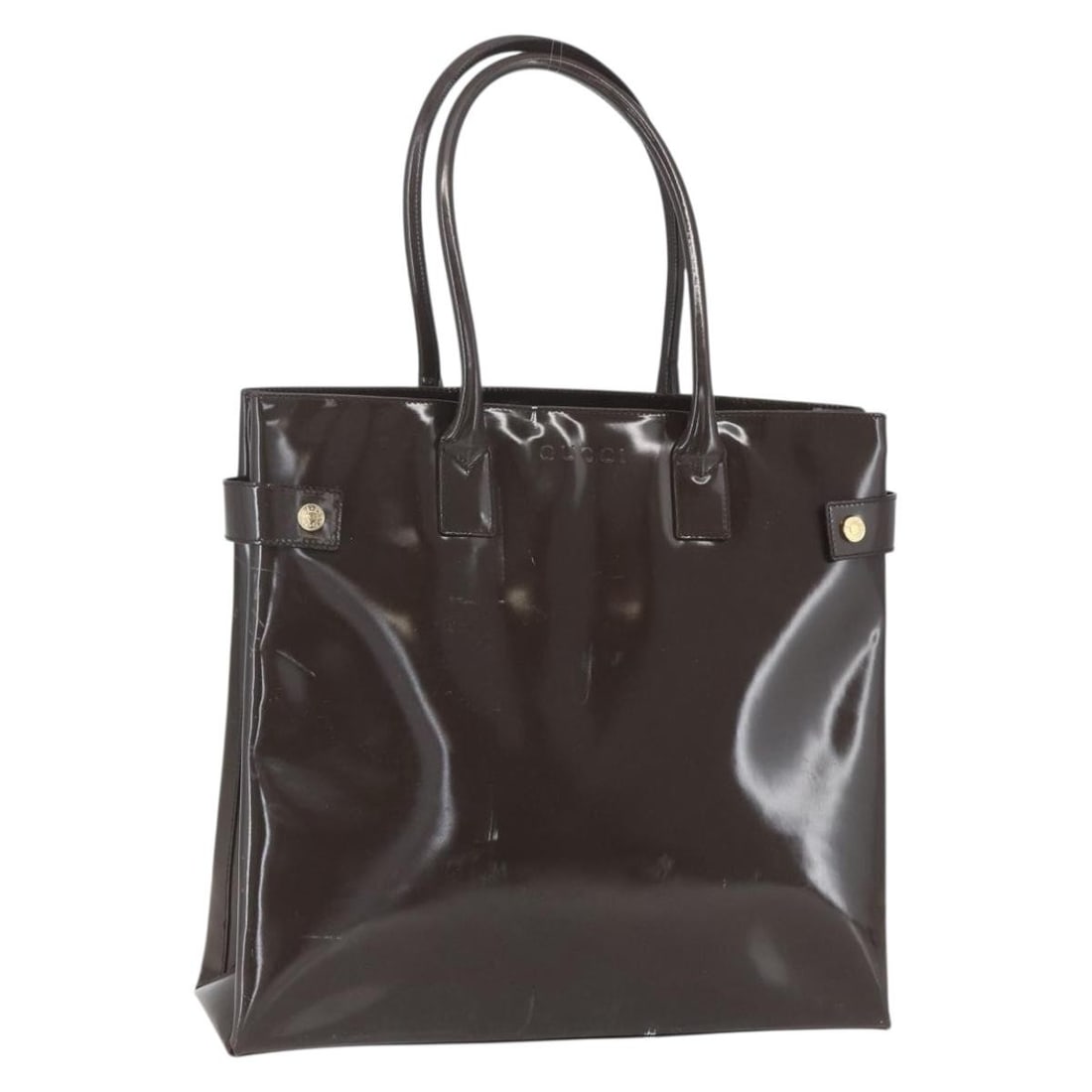 Gucci Brown and Gold Enamel Tote Bag Made in Italy: Gucci Brown and Gold Enamel Tote Bag Made in Italy This is a Gucci tote bag crafted in brown and gold enamel. Made in Italy, the bag features a spacious interior, dual handles, and gold-tone accents. 