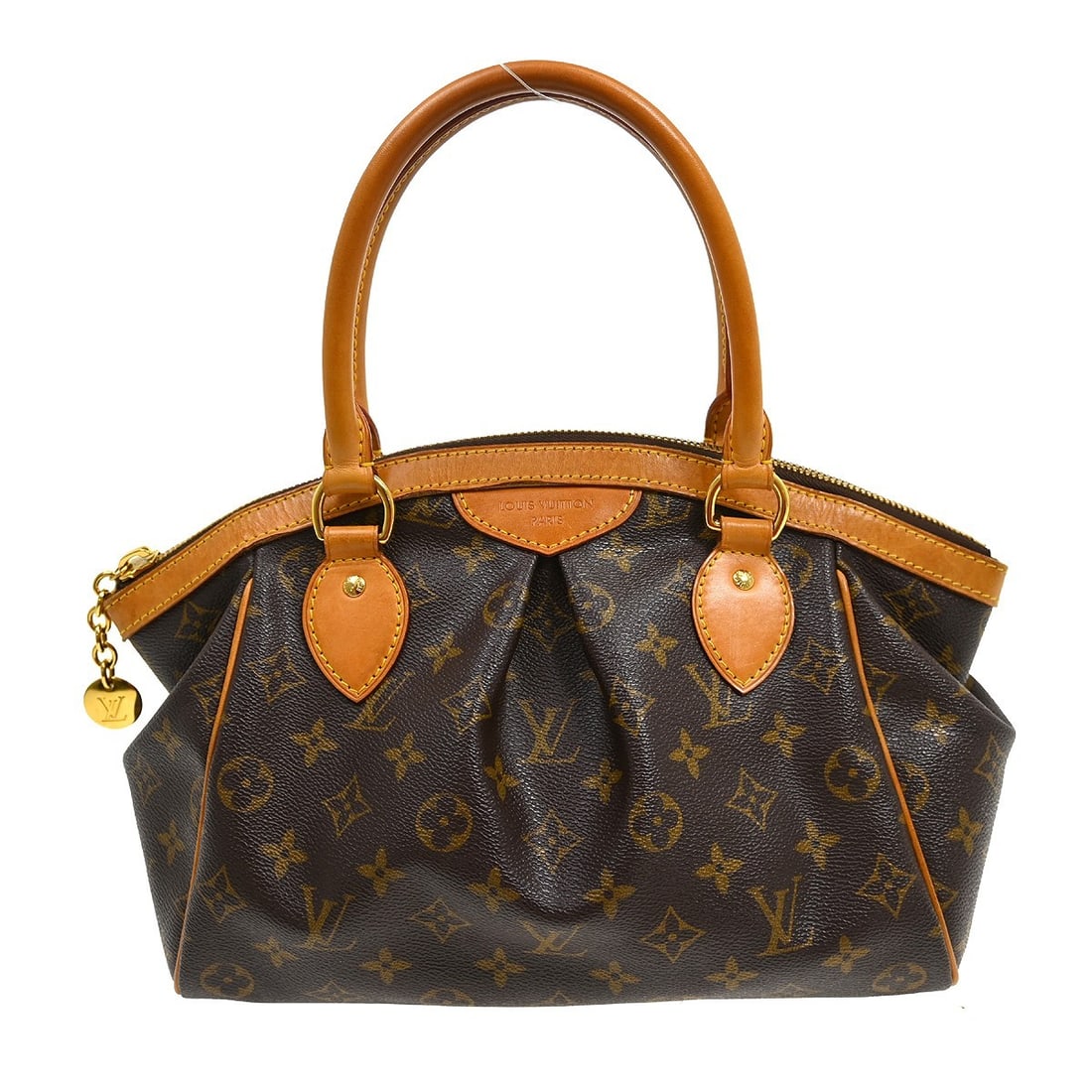 Louis Vuitton Tivoli PM Monogram Canvas Tote Bag M40143: Louis Vuitton Tivoli PM Monogram Canvas Tote Bag M40143 Vintage Louis Vuitton Tivoli PM handbag in Monogram canvas with leather trim and a zip closure. This women's medium tote-style bag features logo