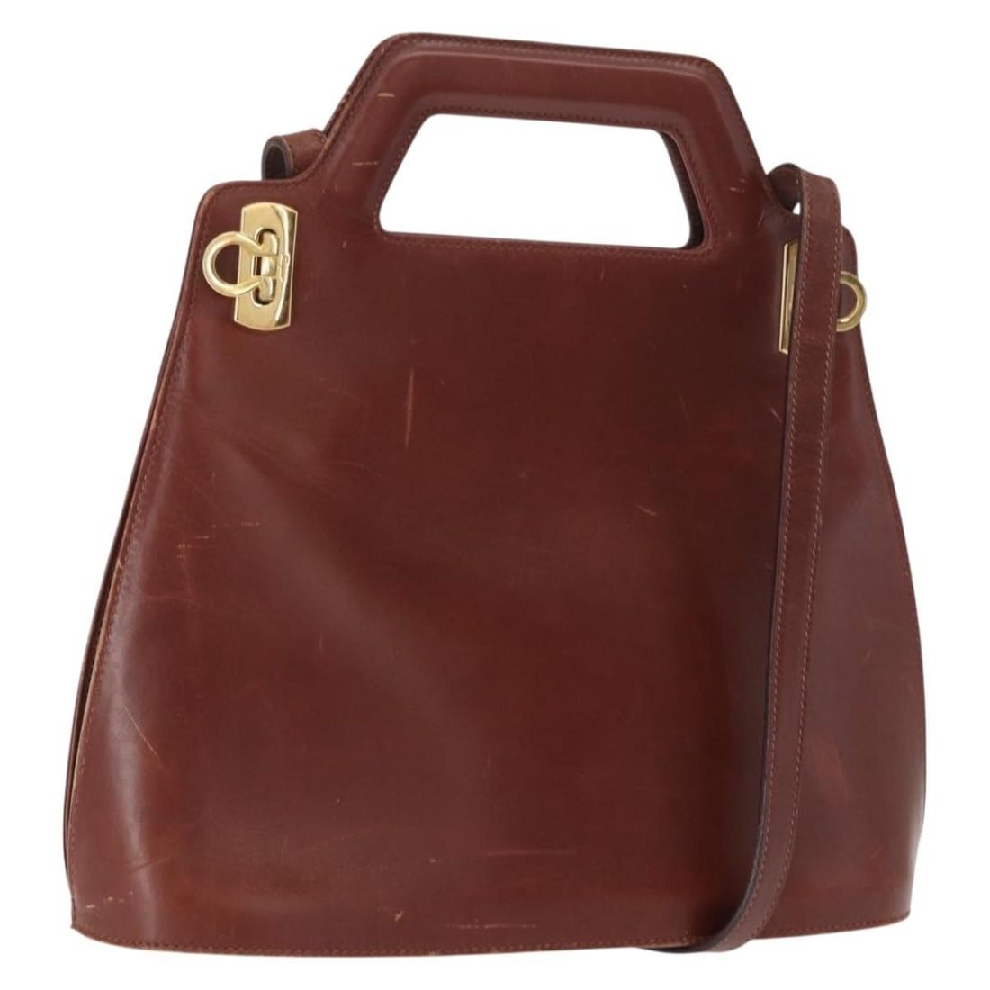 Salvatore Ferragamo Brown Leather Gancini Shoulder Bag Gold Hardware Italy: Salvatore Ferragamo Brown Leather Gancini Shoulder Bag Gold Hardware Italy This Salvatore Ferragamo Gancini shoulder bag features a brown and gold leather exterior with a classic design. Made in Italy