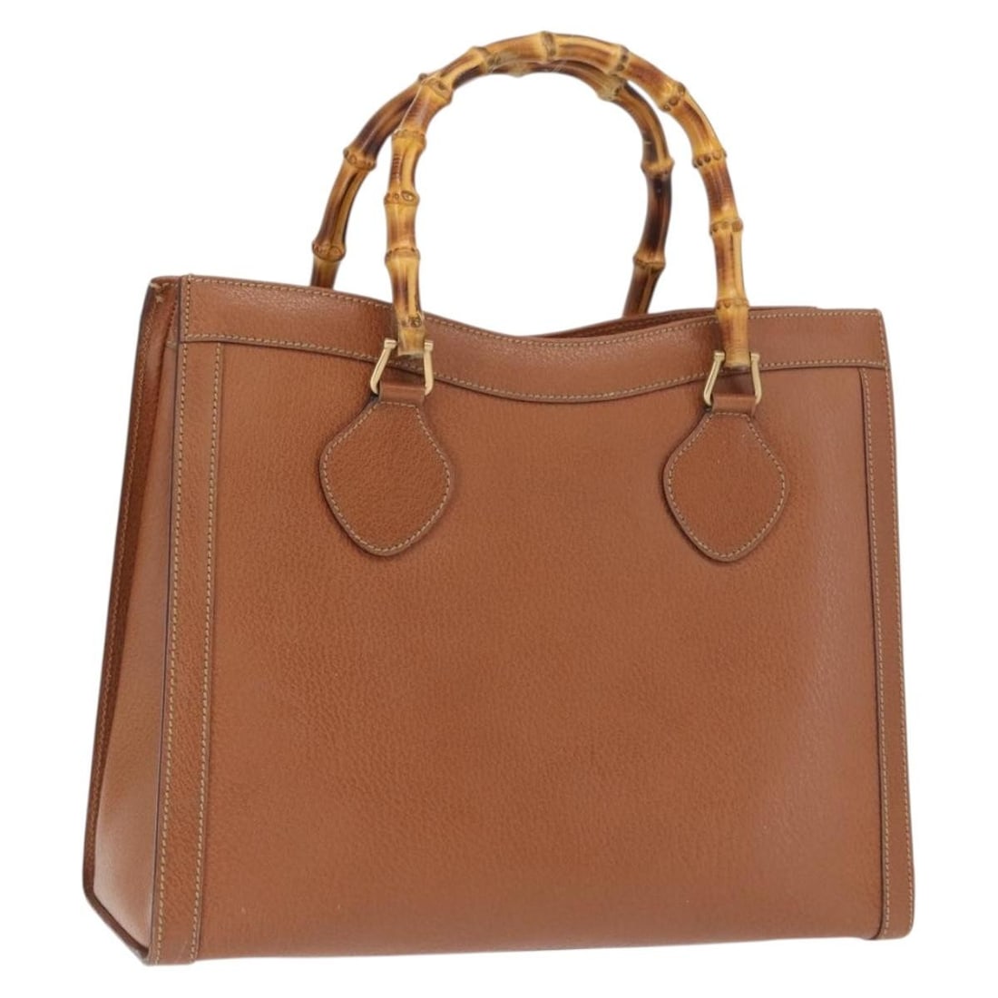 Leather Gucci Tote Bag Brown Gold Bamboo Handle Italy 00228530260: Leather Gucci Tote Bag Brown Gold Bamboo Handle Italy 00228530260 This Gucci tote bag features brown leather with gold-tone accents, crafted in Italy. It offers a spacious interior with dimensions app