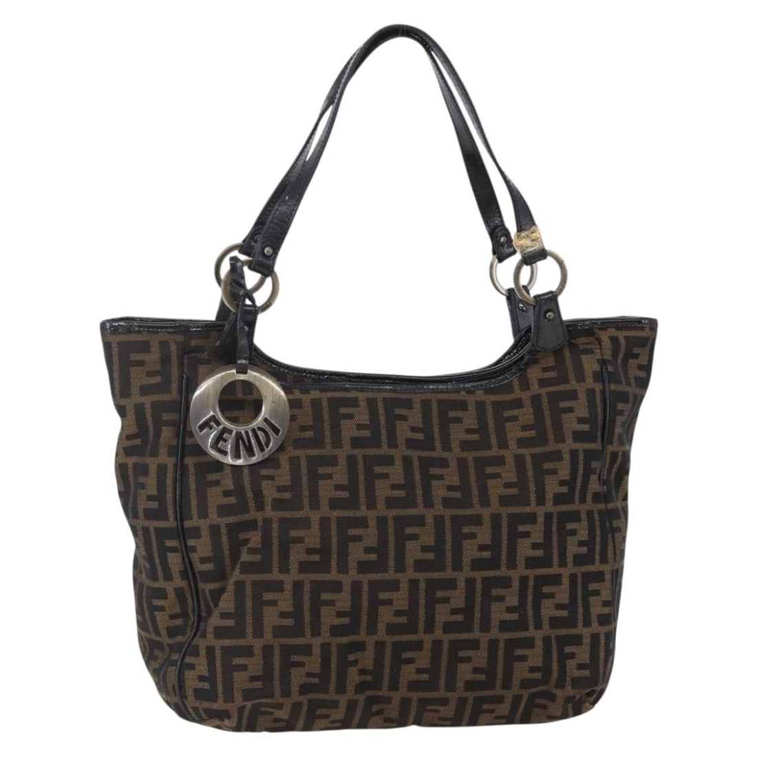 FENDI Zucca Canvas Tote Bag Black Brown Made in Italy: FENDI Zucca Canvas Tote Bag Black Brown Made in Italy The FENDI Zucca Canvas Tote Bag showcases a stylish blend of black and brown hues, crafted in Italy from durable Zucca canvas. This tote bag is de