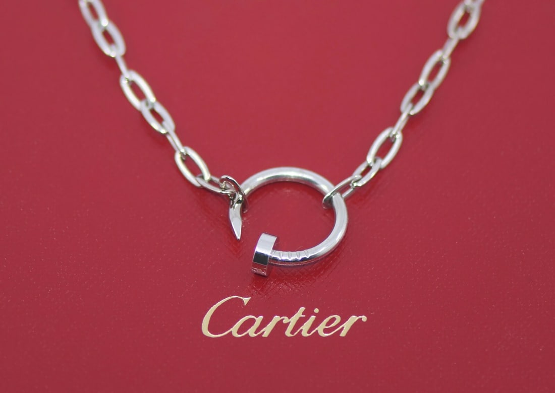 Cartier Juste Un Clou 18K White Gold Pendant Necklace with Box and Certificate: Cartier Juste Un Clou 18K White Gold Pendant Necklace with Box and Certificate Exquisite and sophisticated, this Cartier Juste Un Clou necklace is crafted from 18K white gold, showcasing a chic pendan