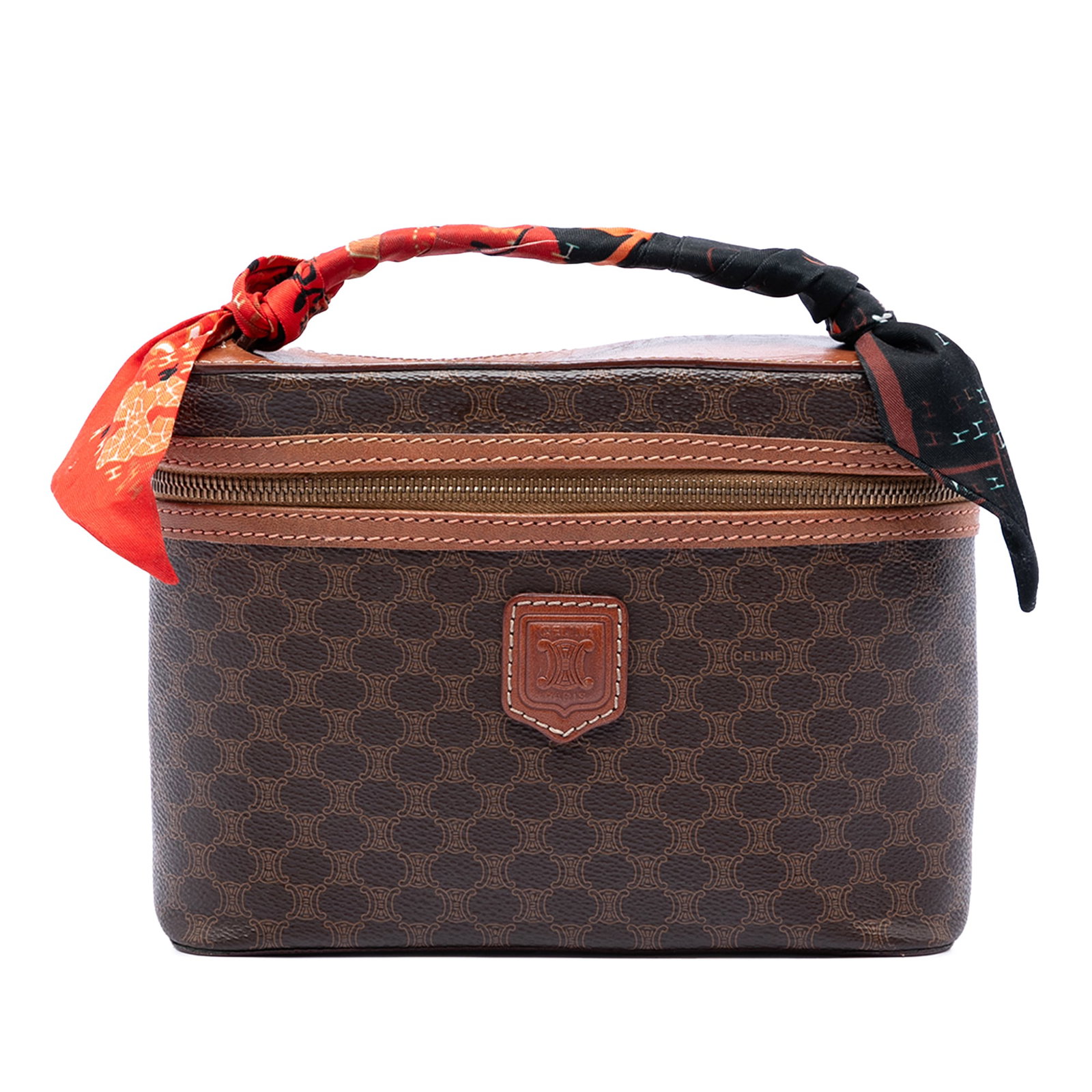 Celine Macadam Vanity Bag Coated Canvas Brown: Celine Macadam Vanity Bag Coated Canvas Brown This Celine Macadam vanity bag features a durable coated canvas body with leather trim, a flat top handle adorned with a scarf, and a zip-around closure. 