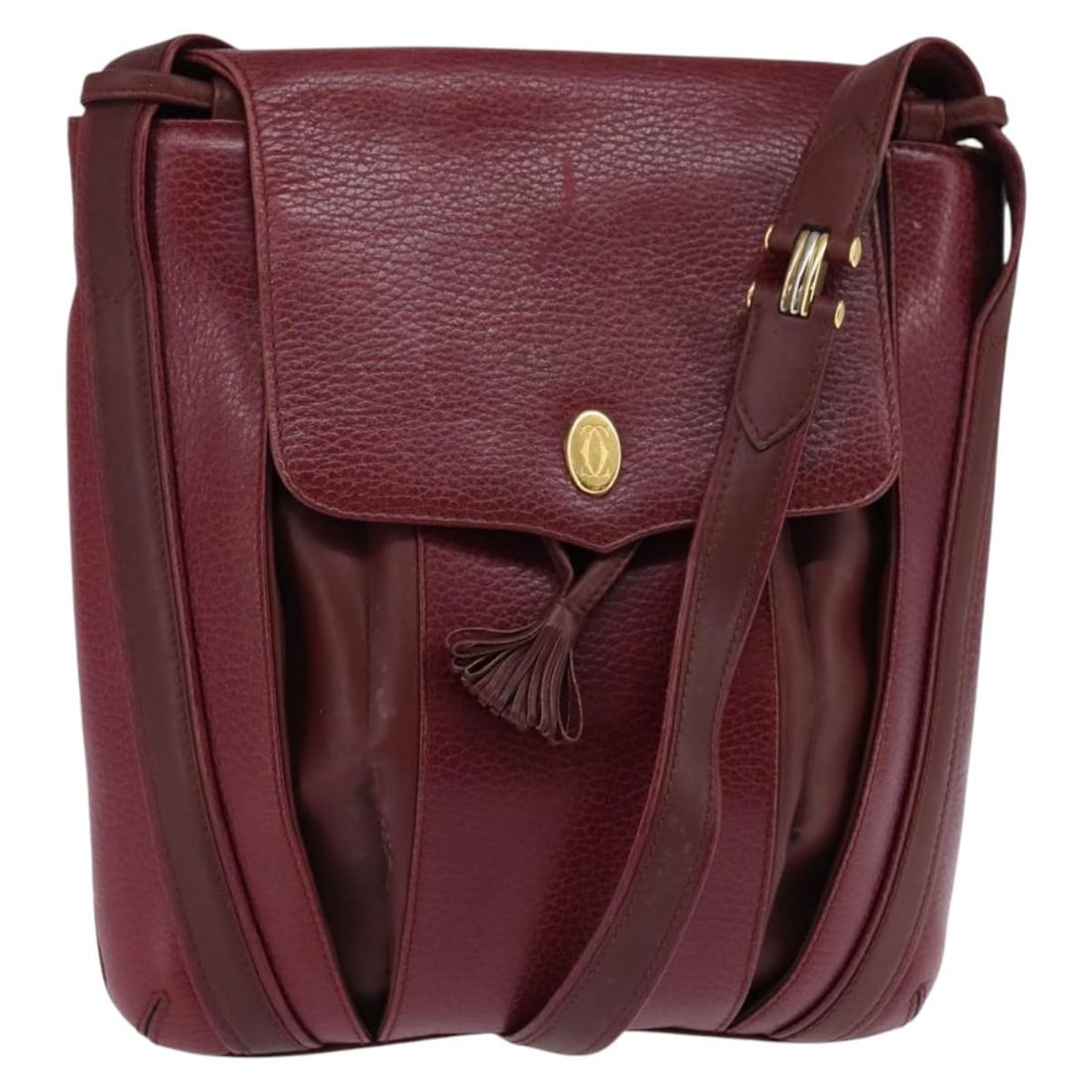 CARTIER Bordeaux Leather Shoulder Bag with Gold Accents: CARTIER Bordeaux Leather Shoulder Bag with Gold Accents This exquisite CARTIER shoulder bag is crafted from high-quality leather in an elegant bordeaux and gold color combination. The bag showcases a 