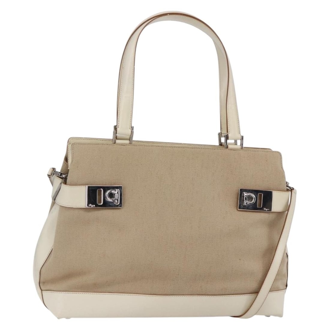 Salvatore Ferragamo Gancini Beige Silver Canvas Tote Bag Authentic: Salvatore Ferragamo Gancini Beige Silver Canvas Tote Bag Authentic This Salvatore Ferragamo Gancini Tote Bag is a stylish and functional accessory, crafted from durable canvas in a chic beige and silv