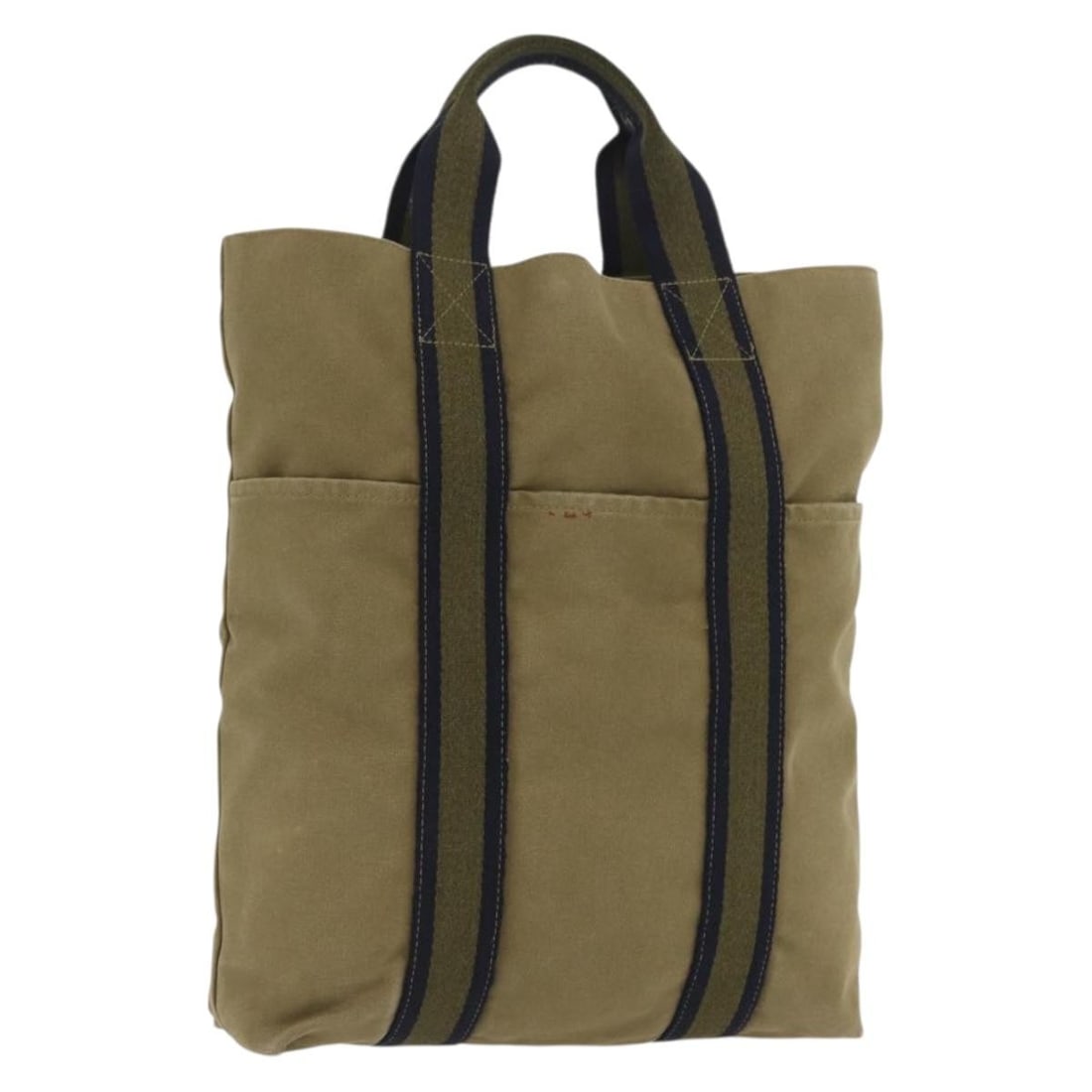 Khaki Canvas Hermes Fourre Tout Cabass Handbag Made in France: Khaki Canvas Hermes Fourre Tout Cabass Handbag Made in France This Hermes Fourre Tout Cabass handbag features a khaki canvas exterior and is crafted in France. The bag shows signs of heavy use, includ