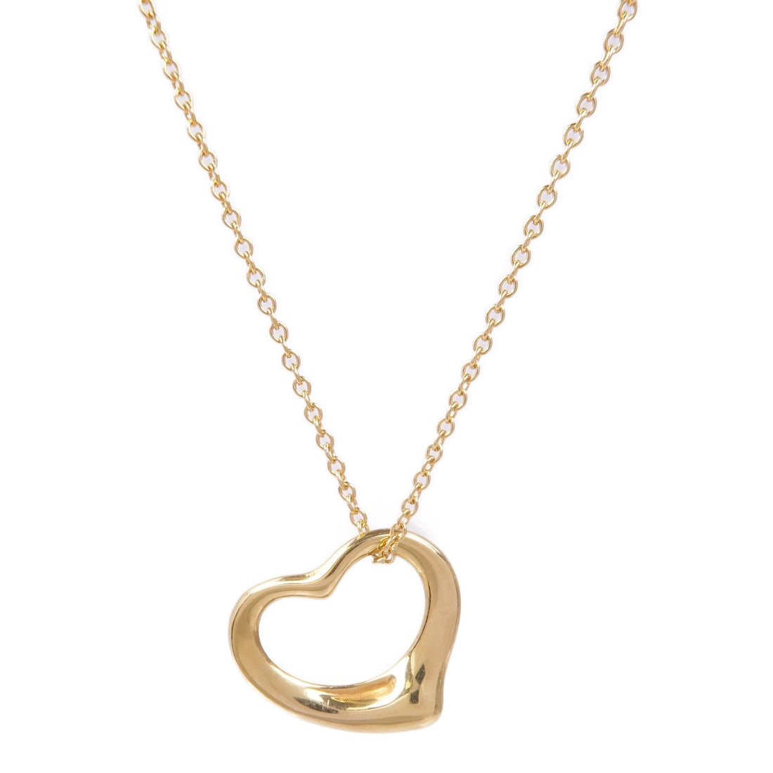Tiffany Co 18K Yellow Gold Open Heart Pendant Necklace: Tiffany Co 18K Yellow Gold Open Heart Pendant Necklace This Tiffany & Co. Open Heart Necklace is crafted from 18K yellow gold, featuring a classic open heart design. Designed for women, the necklace d