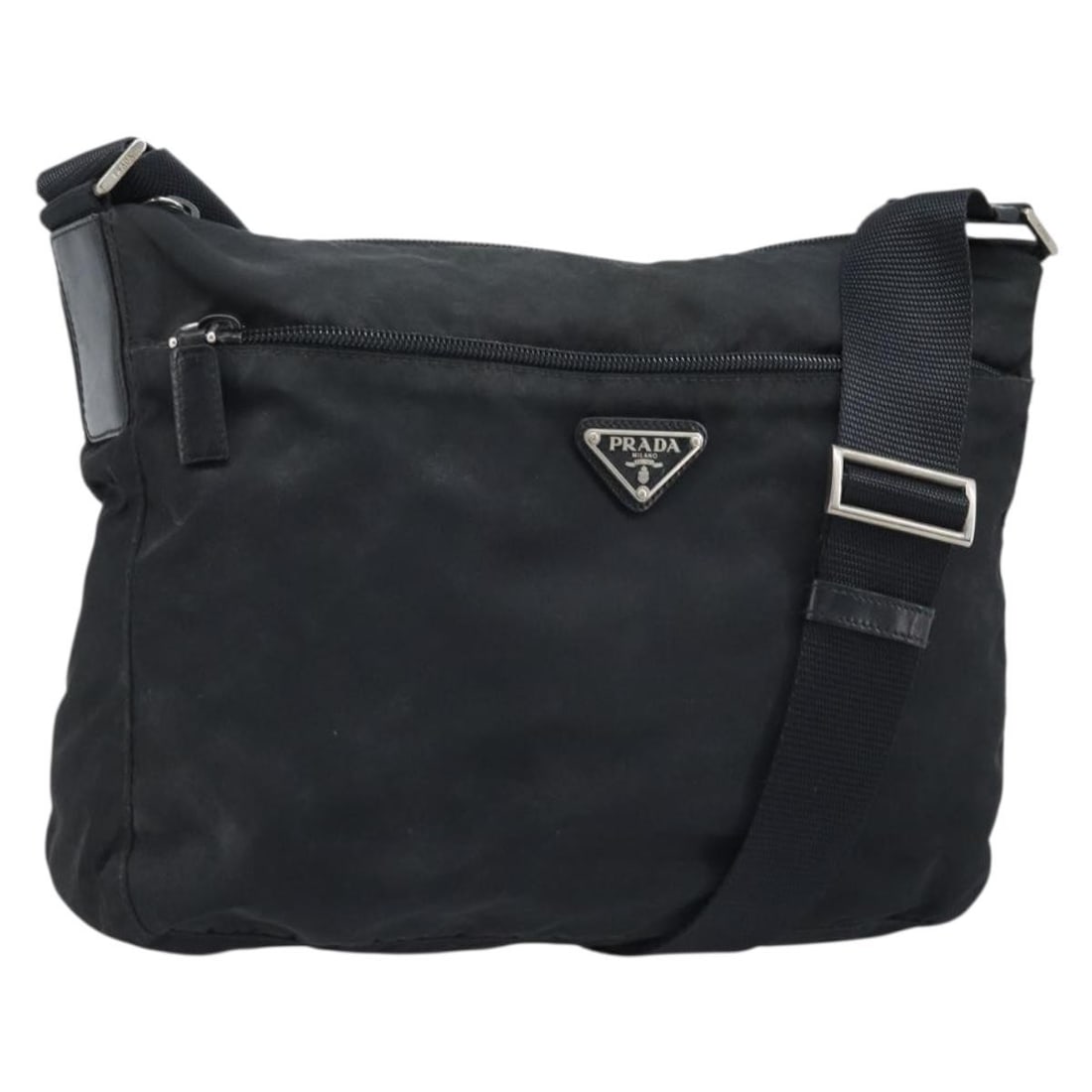 Prada Black Nylon Shoulder Bag Silver Trim Italy: Prada Black Nylon Shoulder Bag Silver Trim Italy This PRADA shoulder bag is crafted from black nylon with silver-tone accents, offering a sleek and functional design. Made in Italy, the bag features a