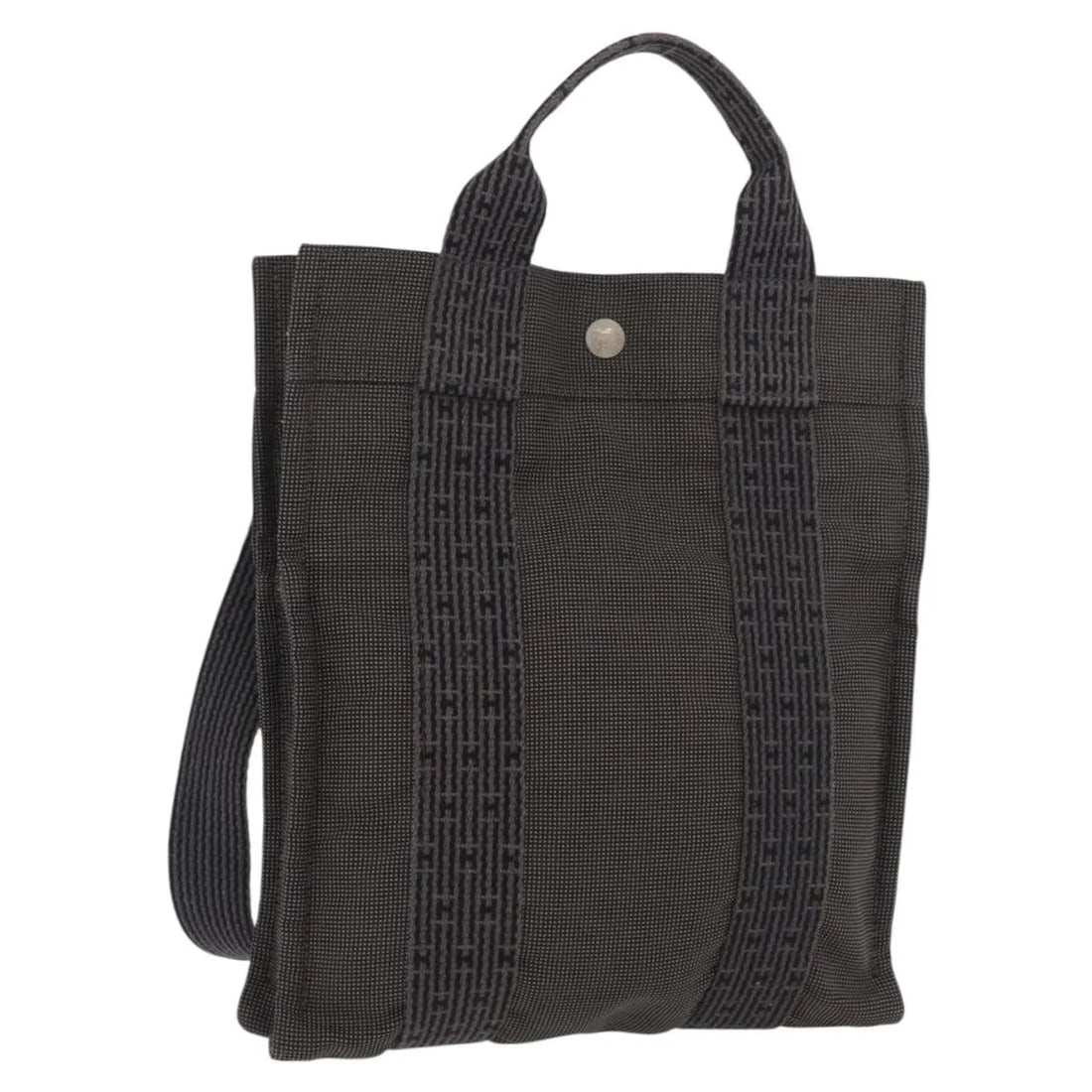 Gray Canvas Unisex Bag Hermes Herline 25cm x 30cm x 5cm: Gray Canvas Unisex Bag Hermes Herline 25cm x 30cm x 5cm Hermes Herline canvas bag in gray, designed for unisex use. This piece shows visible wear consistent with fair overall condition, including shap