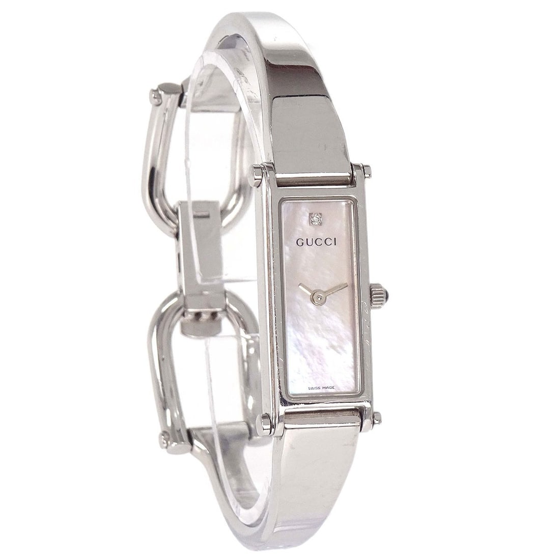 Gucci 1500L stainless steel women's quartz wristwatch: Gucci 1500L stainless steel women's quartz wristwatch Gucci 1500L women's wristwatch with a quartz movement, rectangular stainless steel case, and stainless steel band. It features a white analog dial