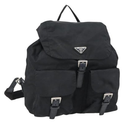Black Nylon Backpack PRADA Silver Tone with Guarantee Card: Black Nylon Backpack PRADA Silver Tone with Guarantee Card Authentic Prada backpack in black nylon with silver-tone accents. Made in Italy, this backpack includes the guarantee card. Condition is heav