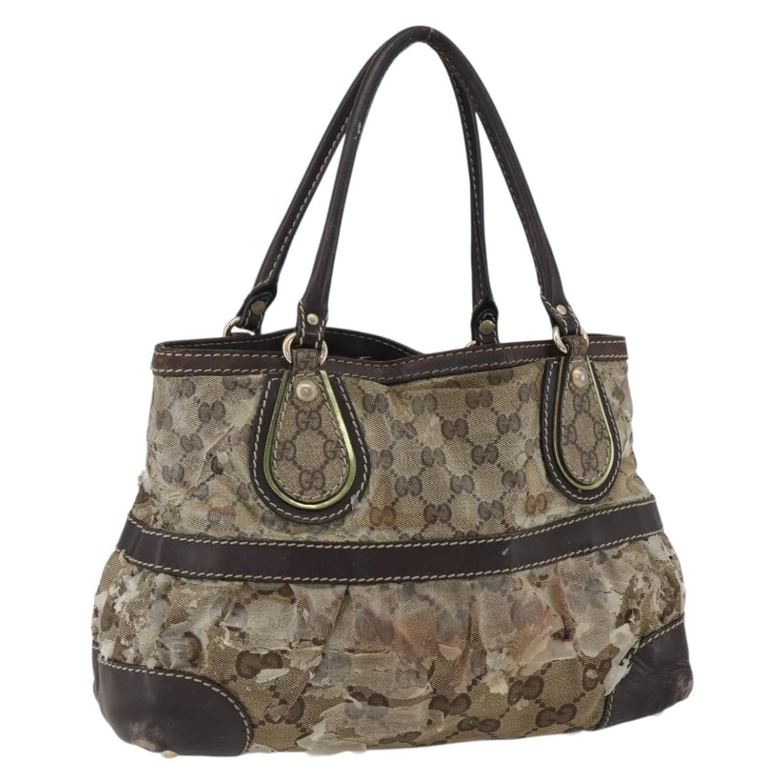 Gold Beige Coated Canvas GG Crystal Tote by Gucci Model 223964: Gold Beige Coated Canvas GG Crystal Tote by Gucci Model 223964 This Gucci GG Crystal tote bag features coated canvas in gold and beige tones with the signature GG pattern. The bag includes dual handle