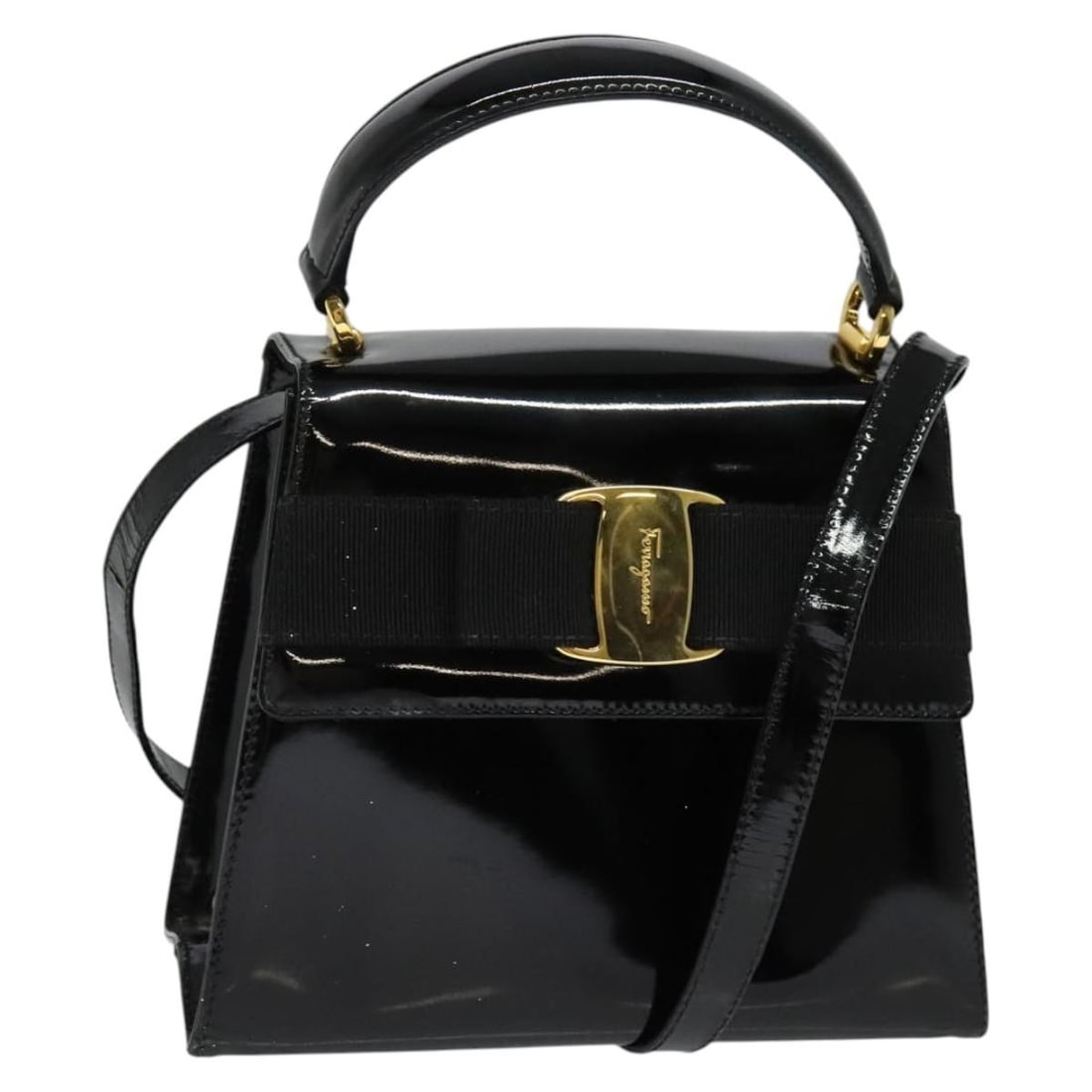 Salvatore Ferragamo Vala 2-Way Hand Bag Patent Leather Black Gold Auth: Salvatore Ferragamo Vala 2-Way Hand Bag Patent Leather Black Gold Auth Introducing the Salvatore Ferragamo Vala Hand Bag, a luxurious accessory crafted from high-quality patent leather in a striking b