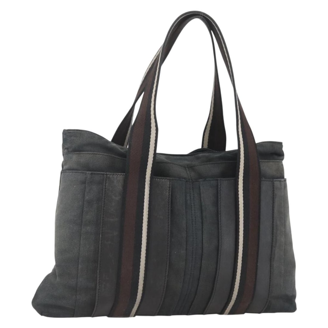 Hermes Toroca Horizontal MM Canvas Tote Bag Black and Brown France: Hermes Toroca Horizontal MM Canvas Tote Bag Black and Brown France This Hermes Toroca Horizontal MM hand bag features a black and brown canvas exterior and is crafted in France. The bag shows signific