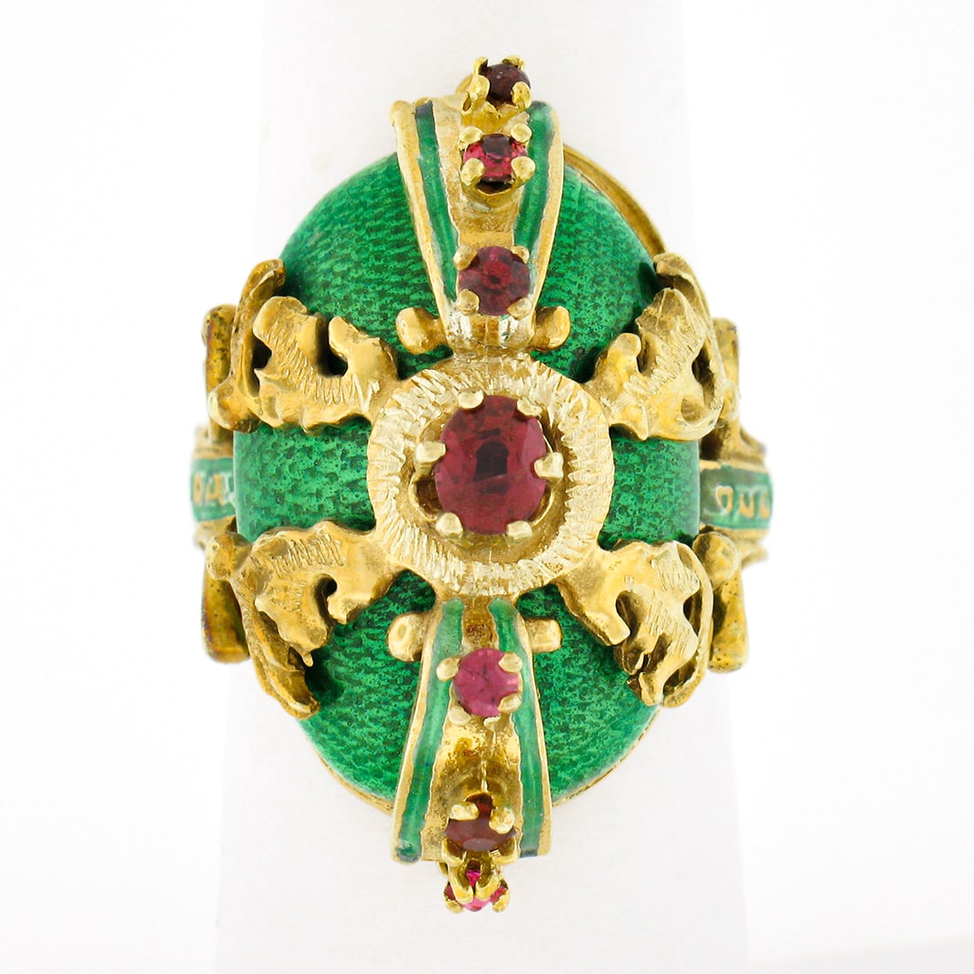 Vintage 14K Yellow Gold Green Enamel Ruby Cocktail Ring 0.55ctw: Vintage 14K Yellow Gold Green Enamel Ruby Cocktail Ring 0.55ctw This stunning vintage cocktail ring showcases a unique design crafted in solid 14K yellow gold, featuring a vibrant green enamel dome ad