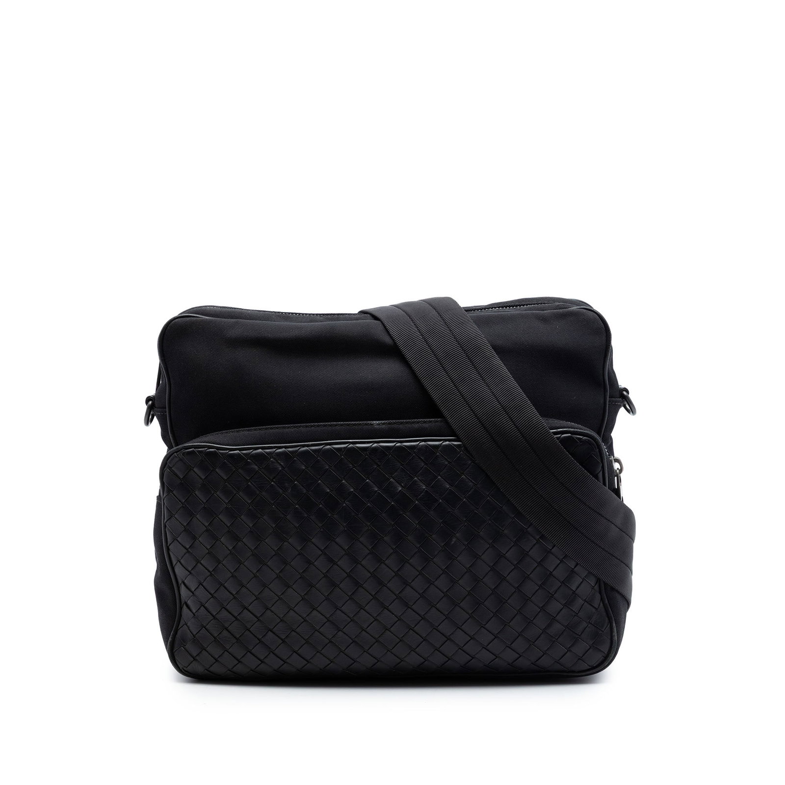 Bottega Veneta black canvas crossbody with Nappa Intrecciato trim: Bottega Veneta black canvas crossbody with Nappa Intrecciato trim Bottega Veneta messenger bag crafted with a canvas body and nappa leather Intrecciato trim. This crossbody style features an adjustabl