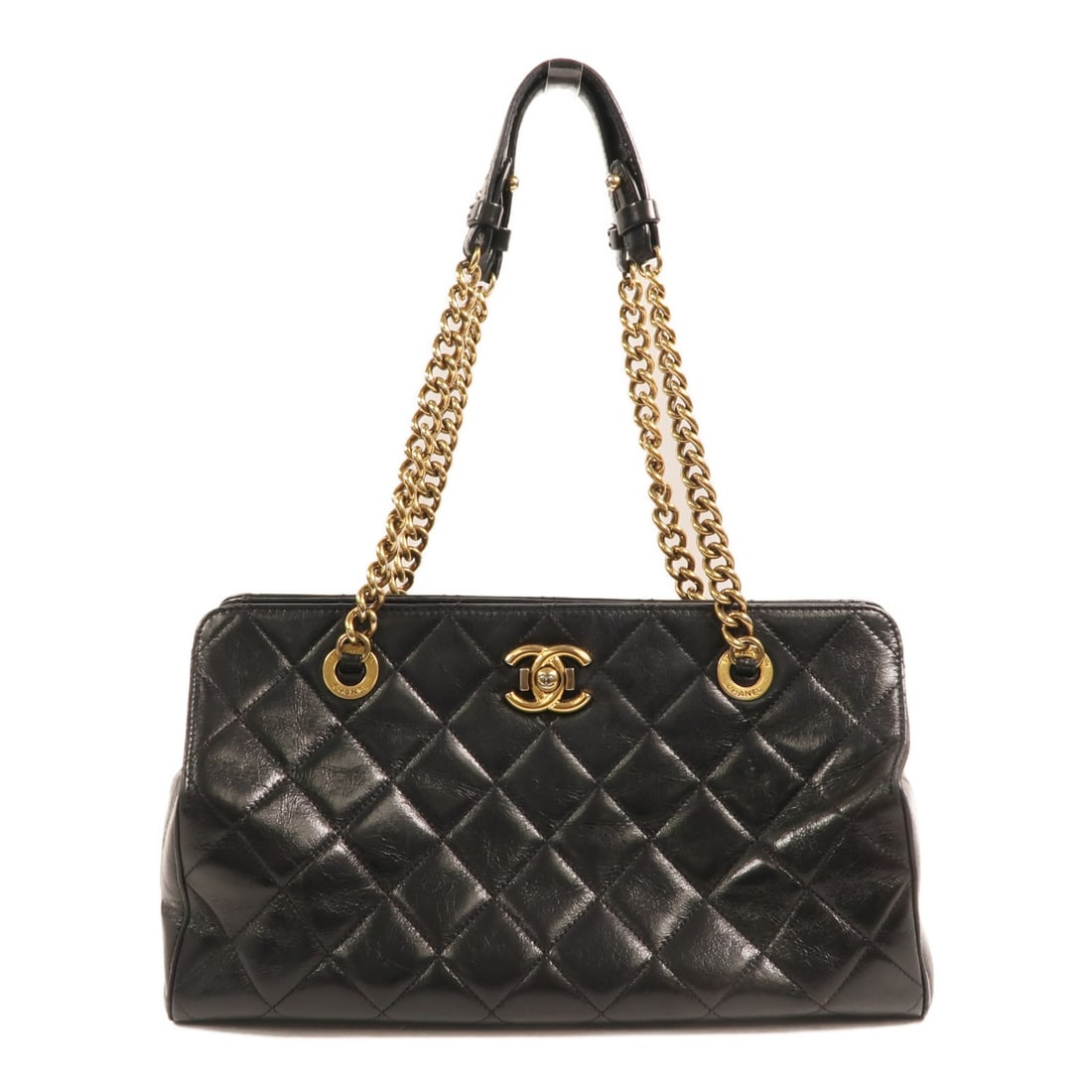 Chanel Perfect Edge Black Calfskin Tote with Gold Chain Shoulder Strap: Chanel Perfect Edge Black Calfskin Tote with Gold Chain Shoulder Strap This CHANEL CC Perfect Edge Tote is crafted from black calfskin leather and features a classic chain shoulder strap design. The b