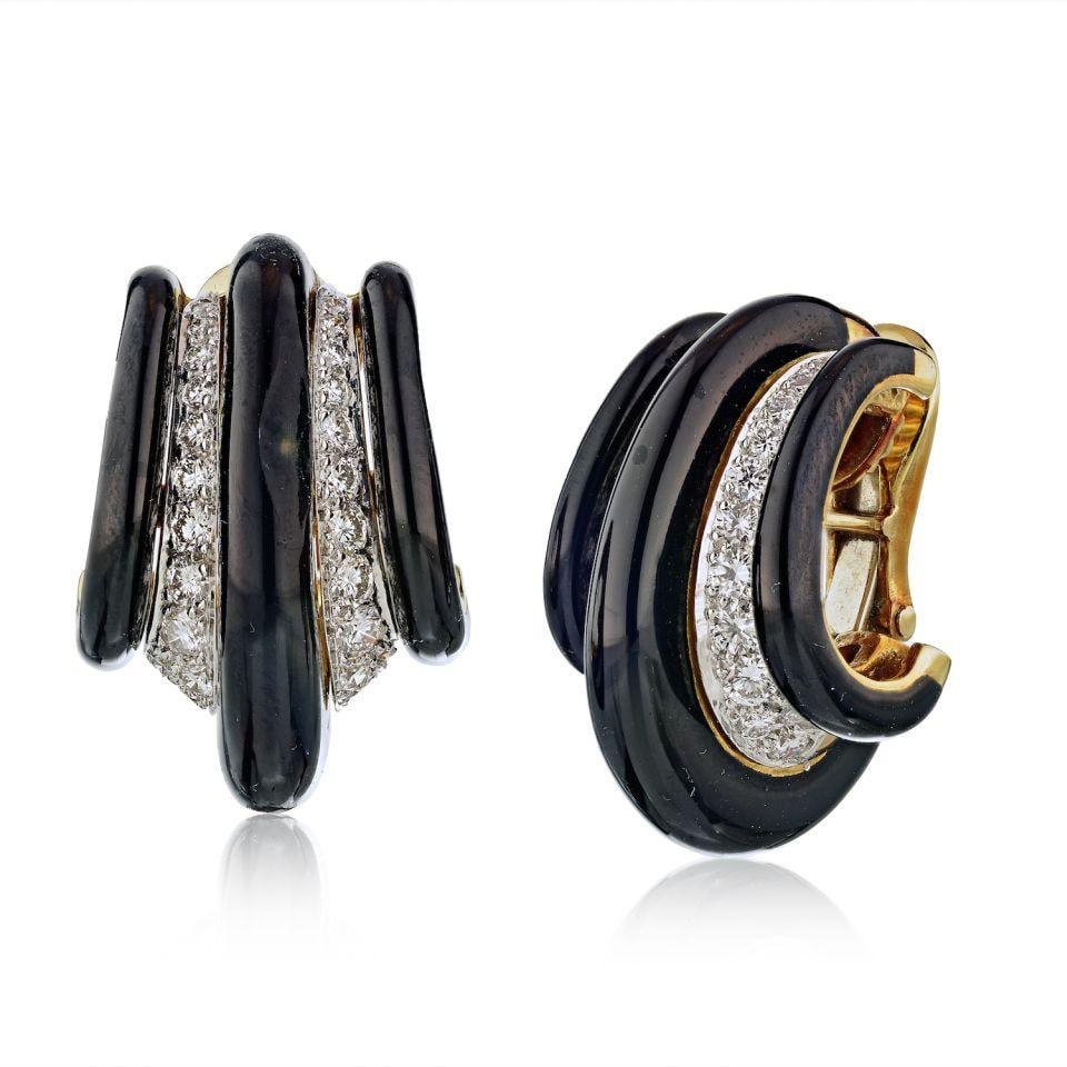 David Webb 1980s Platinum 18K Gold Black Enamel Diamond Earrings: David Webb 1980s Platinum 18K Gold Black Enamel Diamond Earrings Enhance your jewelry collection with these exquisite vintage David Webb earrings from the 1980s. Crafted from a luxurious combination o