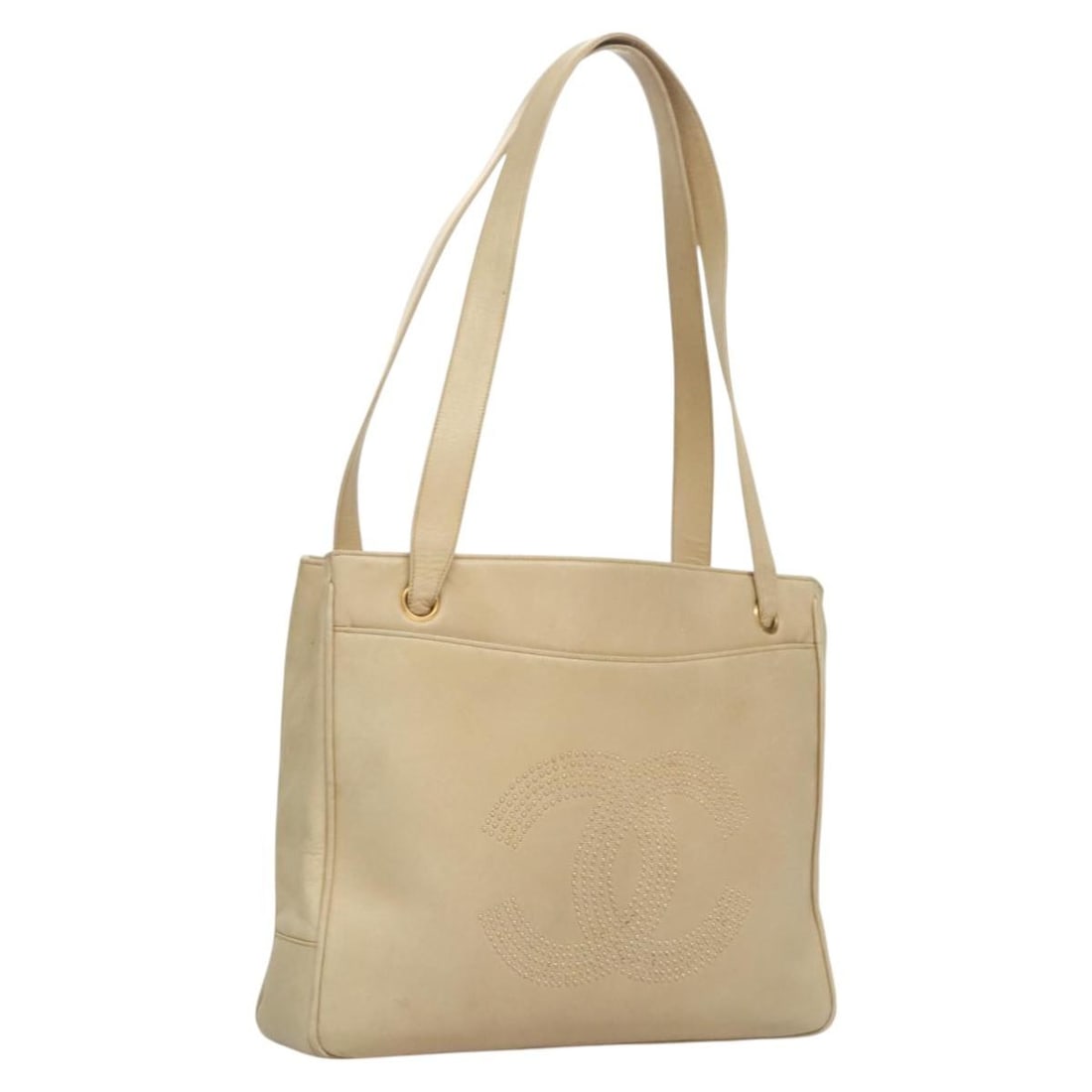 Chanel Beige Lambskin Shoulder Purse with Gold CC Logo: Chanel Beige Lambskin Shoulder Purse with Gold CC Logo This CHANEL Coco shoulder bag is crafted from beige lambskin leather with gold-tone accents. Designed for women, the bag features a classic CC lo