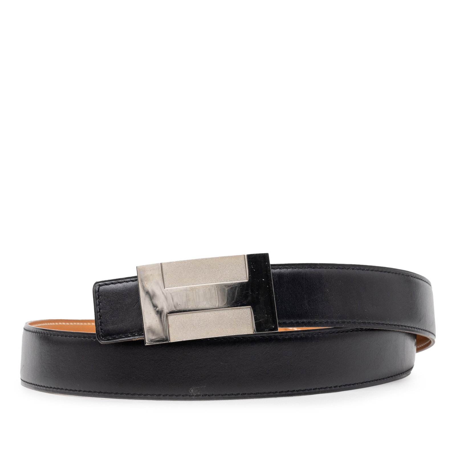 Hermes reversible leather belt with H plate silver-tone hardware: Hermes reversible leather belt with H plate silver-tone hardware This Hermes Box Calf H Plate Reversible Belt features a Box Calf leather body with silver-tone hardware and a peg-in hole closure. The 
