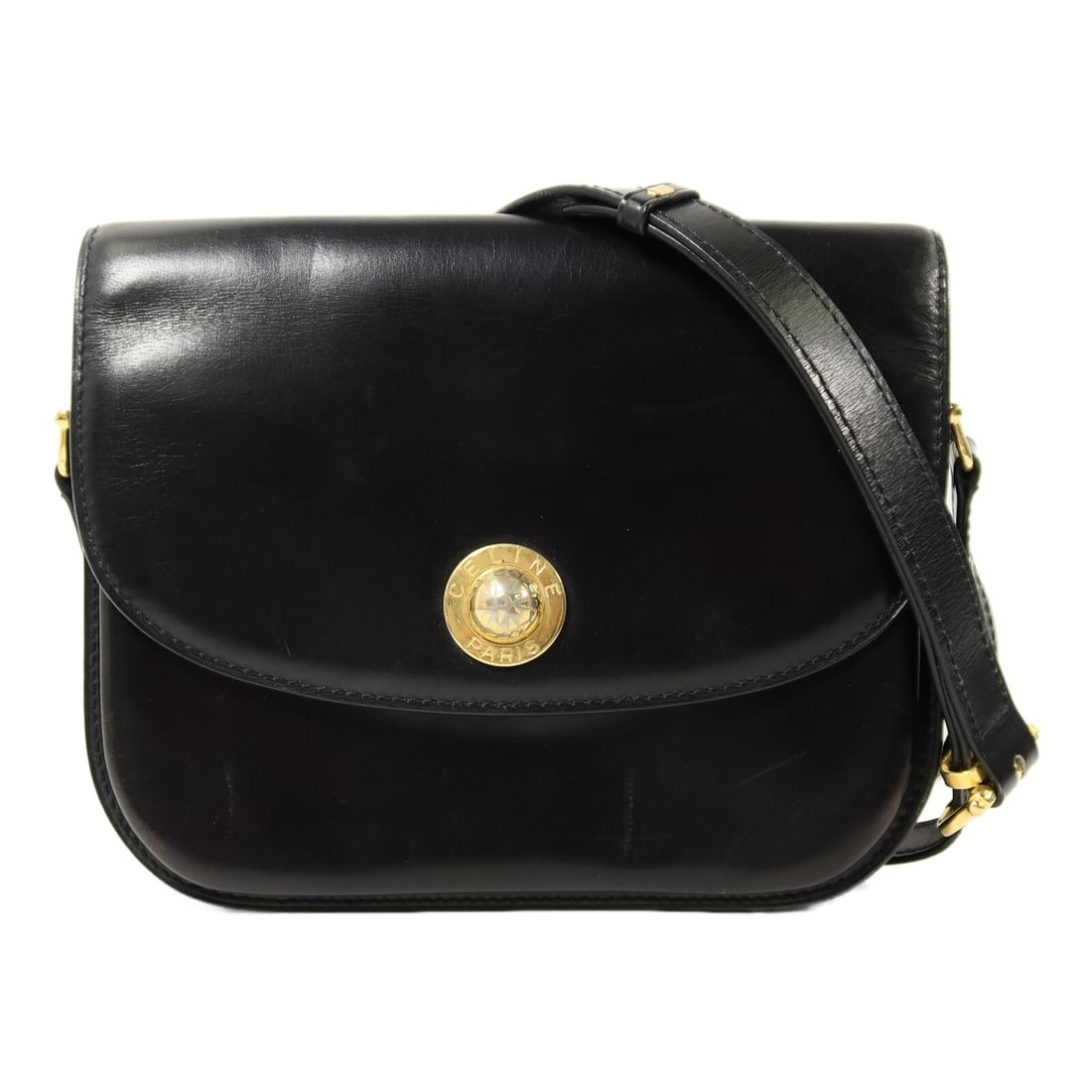 Celine Star Ball Black Calfskin Shoulder Bag GHW: Celine Star Ball Black Calfskin Shoulder Bag GHW This vintage shoulder bag features a distinctive star ball design and is crafted from black calfskin leather. Designed for women, it has a compact silh