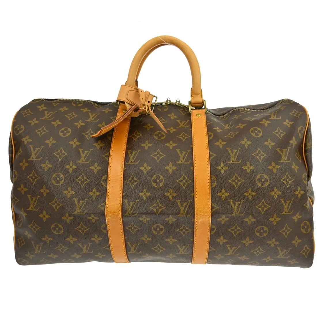 Louis Vuitton Keepall Travel Bag in Brown Monogram Canvas: Louis Vuitton Keepall Travel Bag in Brown Monogram Canvas Louis Vuitton Keepall in brown monogram canvas. This unisex bag is made in France and shows fair overall condition with visible wear. Exterior