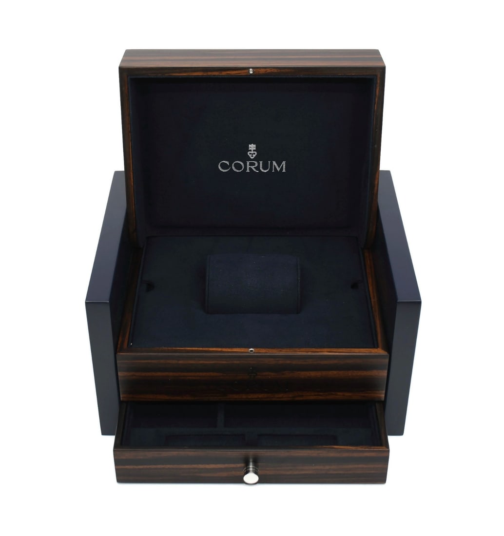 Corum Authentic Large Presentation Watch Box 11x9x6 Inches: Corum Authentic Large Presentation Watch Box 11x9x6 Inches This Corum Large Watch Box is an elegant presentation box designed to hold a single watch. It measures 11 x 9 x 6 inches and comes with its o