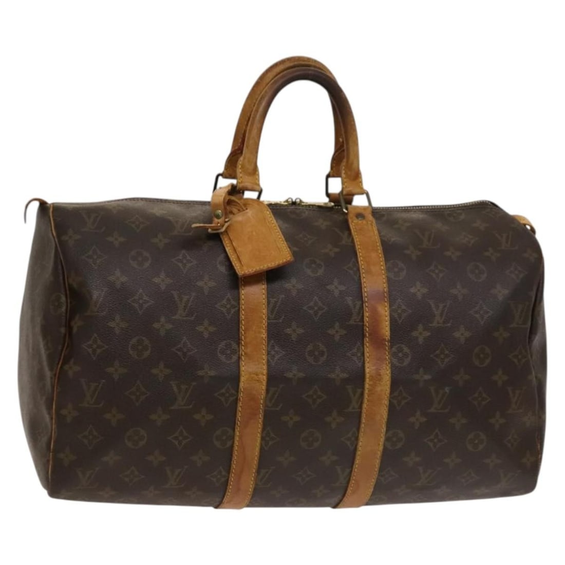 Louis Vuitton M41428 Keepall 45 Monogram Canvas Boston Bag: Louis Vuitton M41428 Keepall 45 Monogram Canvas Boston Bag Louis Vuitton Keepall 45 Boston bag in Monogram canvas with a name tag accessory. Made in France, this women's bag shows heavy use with visib