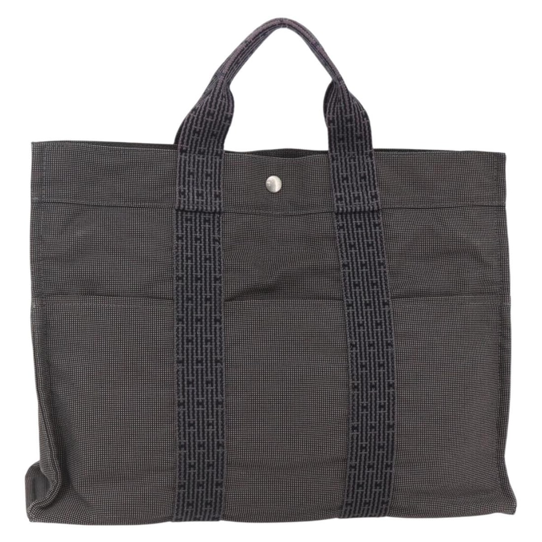 HERMES Her Line MM Gray Canvas Hand Bag France: HERMES Her Line MM Gray Canvas Hand Bag France Introducing the HERMES Her Line MM Hand Bag, a stylish and functional accessory crafted from high-quality gray canvas. This hand bag, made in France, fea