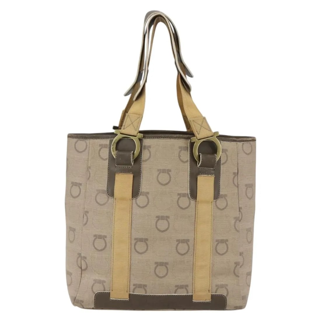 Beige Canvas Handbag Salvatore Ferragamo Gancini Italy: Beige Canvas Handbag Salvatore Ferragamo Gancini Italy This Salvatore Ferragamo Gancini handbag is crafted from beige canvas with leather trim and features metal fittings. It measures 24cm by 24cm by 