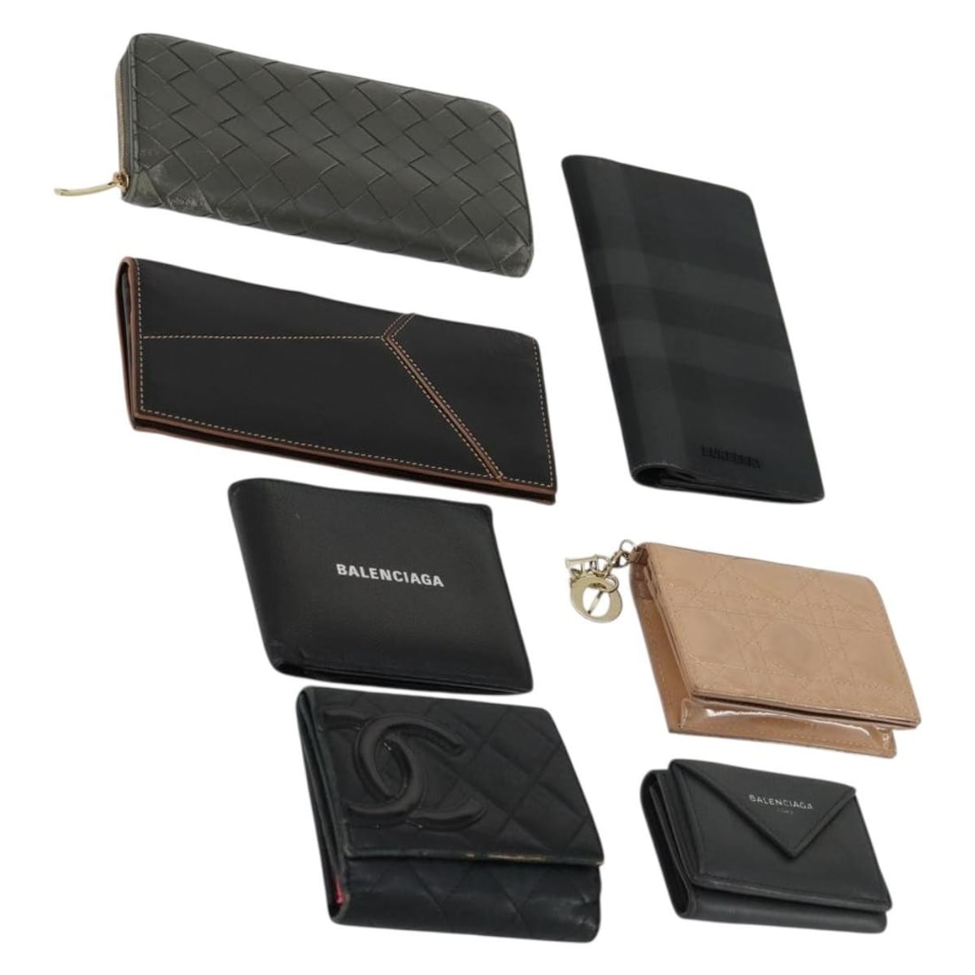 Seven Designer Wallet Collection Featuring CHANEL and Other Luxury Brands: Seven Designer Wallet Collection Featuring CHANEL and Other Luxury Brands This is a special 7-piece set featuring authentic items from luxury brands including CHANEL, Balenciaga, Christian Dior, Burbe