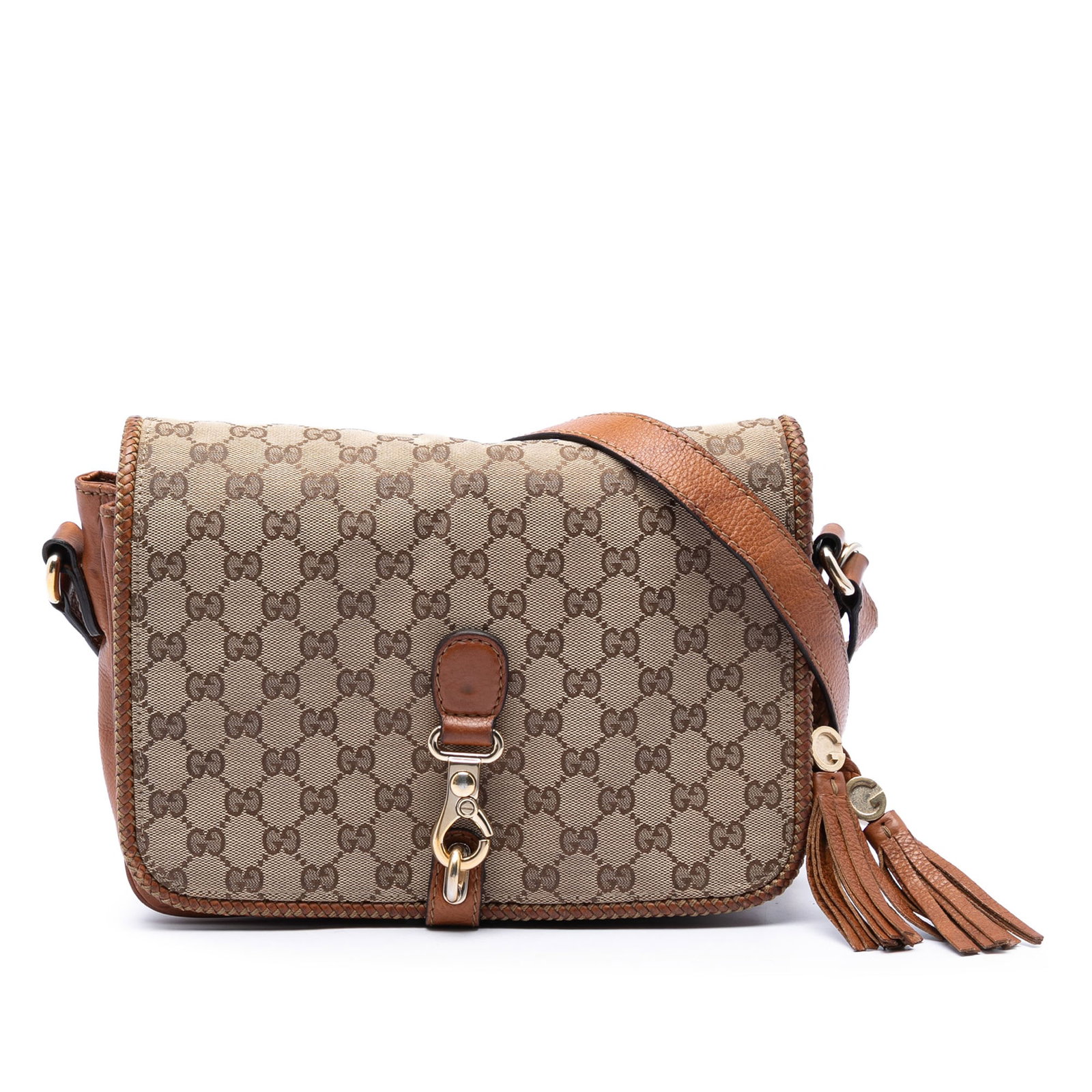 Gucci Marrakech GG Canvas Crossbody Bag Beige Leather Trim: Gucci Marrakech GG Canvas Crossbody Bag Beige Leather Trim Gucci GG Canvas Marrakech Crossbody bag crafted with a canvas body and leather trim. It features an adjustable flat leather strap, a front fl