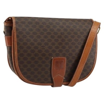 CELINE Macadam Shoulder Bag Brown PVC Leather Gold Tone: CELINE Macadam Shoulder Bag Brown PVC Leather Gold Tone Authentic CELINE shoulder bag in brown and gold with Macadam canvas and PVC leather construction. Made in Italy, this bag shows heavy use with v
