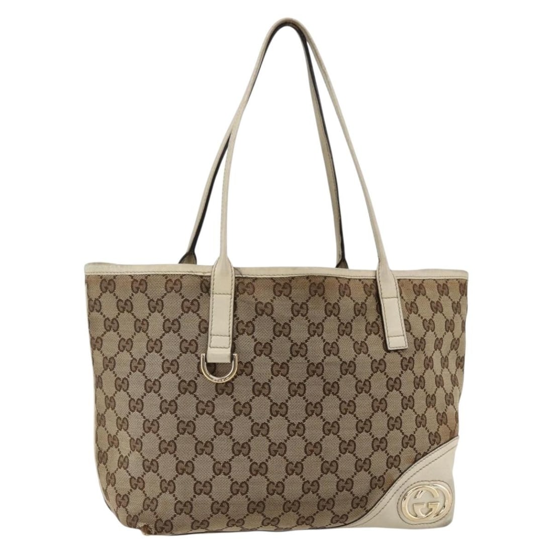 Beige and Gold GG Canvas Tote by Gucci 169946 Italy: Beige and Gold GG Canvas Tote by Gucci 169946 Italy This is a GUCCI GG Canvas Tote Bag in beige and gold, designed for women. Made in Italy, the bag features GG canvas material with gold-tone accents.