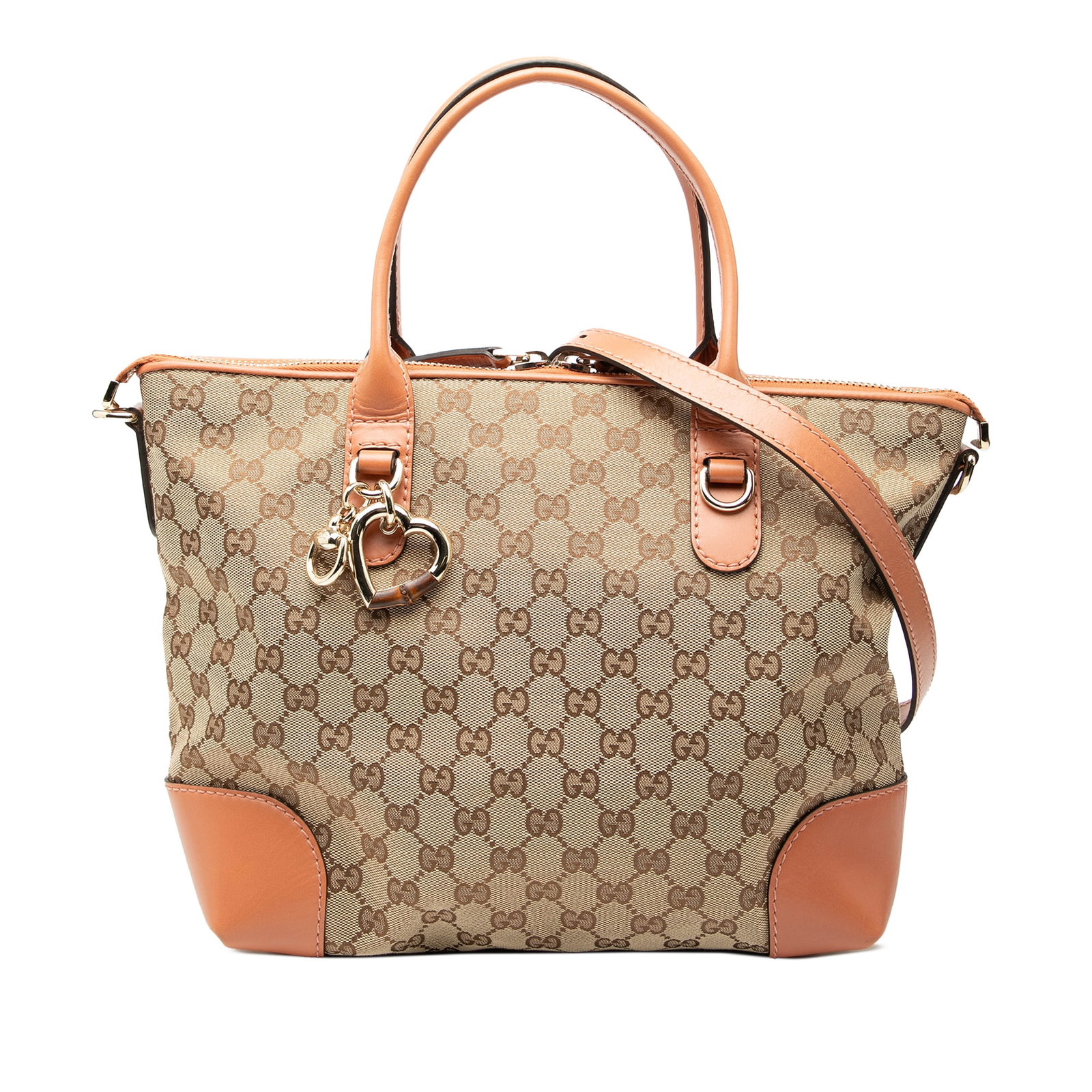 GG Canvas Heart Bit Beige Satchel with Leather Trim by Gucci: GG Canvas Heart Bit Beige Satchel with Leather Trim by Gucci This Gucci GG Canvas Heart Bit Satchel features a beige canvas body with leather trim, flat leather handles, a detachable strap, and a top 