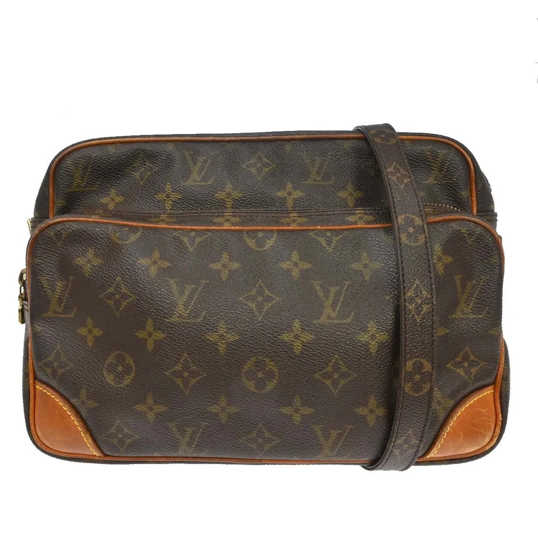 Louis Vuitton Nil Messenger Bag in Monogram Canvas: Louis Vuitton Nil Messenger Bag in Monogram Canvas Louis Vuitton Nil Messenger in brown monogram canvas. This unisex bag is made in France and is presented in fair condition with visible wear througho