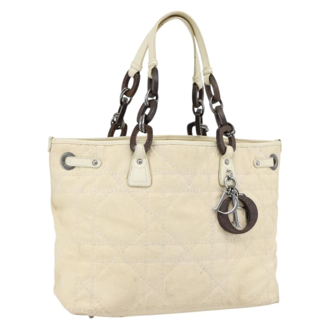Christian Dior Lady Dior Tote Bag in Ivory Silver Coated Canvas: Christian Dior Lady Dior Tote Bag in Ivory Silver Coated Canvas Christian Dior Lady Dior tote bag in ivory and silver coated canvas with chain handles and a charm accessory. Made in Italy, this women'