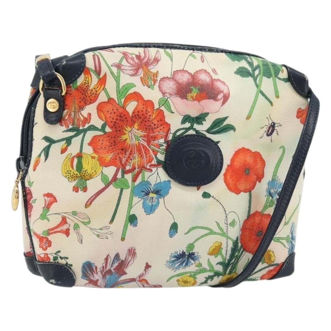 Gucci Flora Canvas and Leather White Gold Shoulder Bag 007 115 1093 Italy: Gucci Flora Canvas and Leather White Gold Shoulder Bag 007 115 1093 Italy This is a GUCCI Flora shoulder bag crafted from white and gold canvas with leather accents. Designed for women, this bag featu