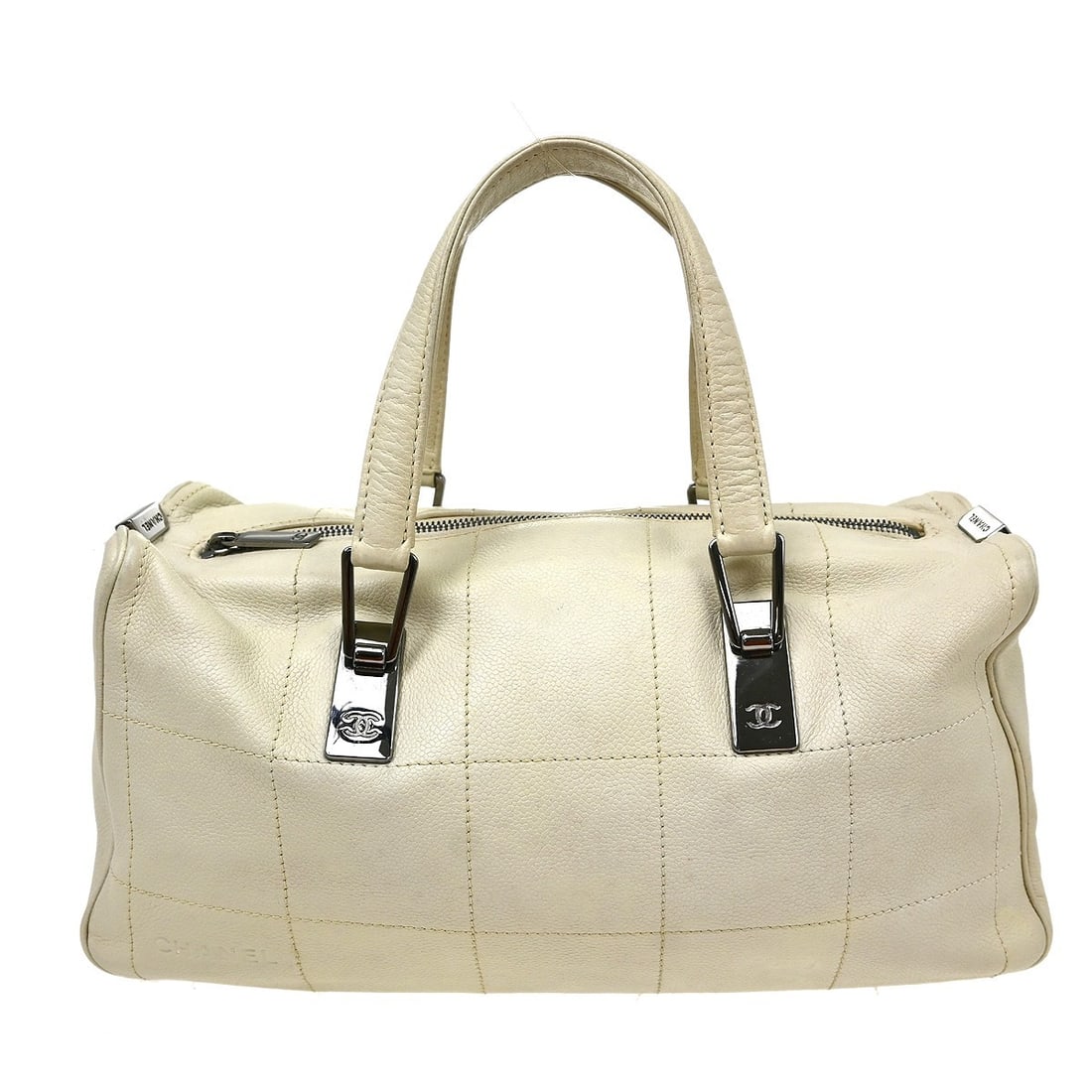 CHANEL Choco Bar Caviar Skin Leather Top Handle Bag White: CHANEL Choco Bar Caviar Skin Leather Top Handle Bag White Chanel Choco Bar handbag in white caviar skin leather with double handles and a white canvas lining. This medium top handle bag features one i