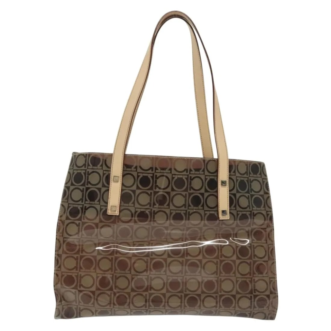 Gancini Brown Vinyl Tote Bag by Salvatore Ferragamo: Gancini Brown Vinyl Tote Bag by Salvatore Ferragamo This Salvatore Ferragamo Gancini Tote is crafted from durable brown plastic and features a spacious design suitable for everyday use. Made in Italy,