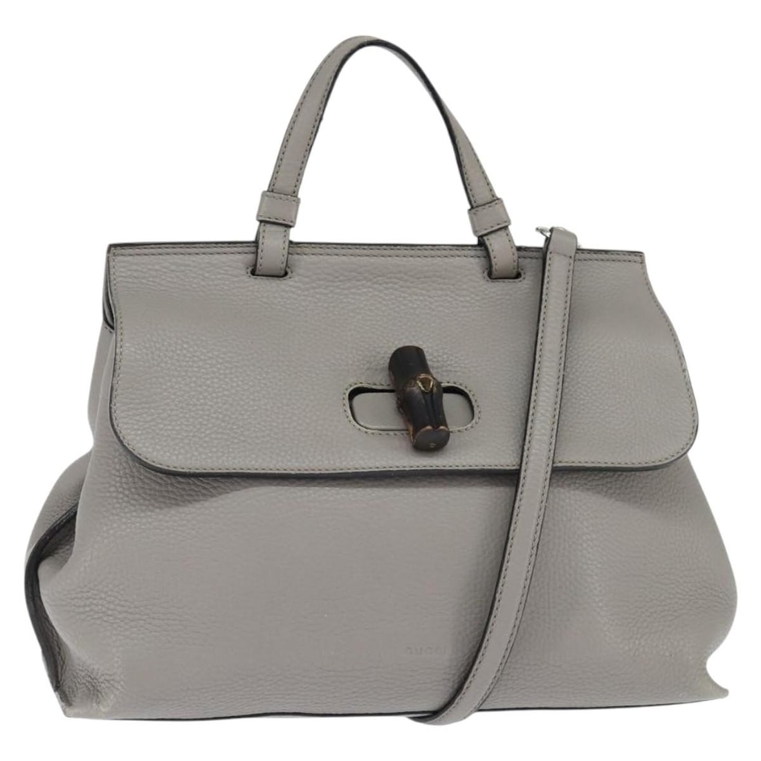 GUCCI Bamboo Leather Hand Bag Gray Silver 392013 Authentic: GUCCI Bamboo Leather Hand Bag Gray Silver 392013 Authentic This stylish GUCCI Bamboo Hand Bag, crafted in Italy, features a sophisticated gray and silver leather exterior. The bag measures approximate