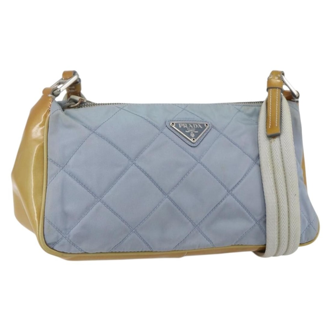 Prada nylon light blue silver shoulder bag with guarantee card: Prada nylon light blue silver shoulder bag with guarantee card This PRADA shoulder bag is crafted from light blue nylon with silver-tone accents. Designed for women, it features a compact silhouette w