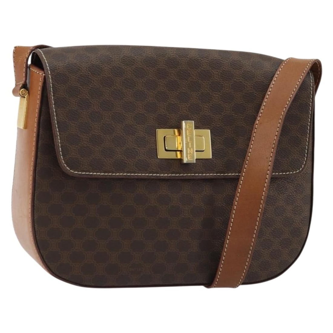 Celine Macadam Canvas Brown Gold Shoulder Bag Italy: Celine Macadam Canvas Brown Gold Shoulder Bag Italy This CELINE Macadam shoulder bag is crafted from durable PVC leather with the brand's signature Macadam canvas in a brown and gold color scheme. Des