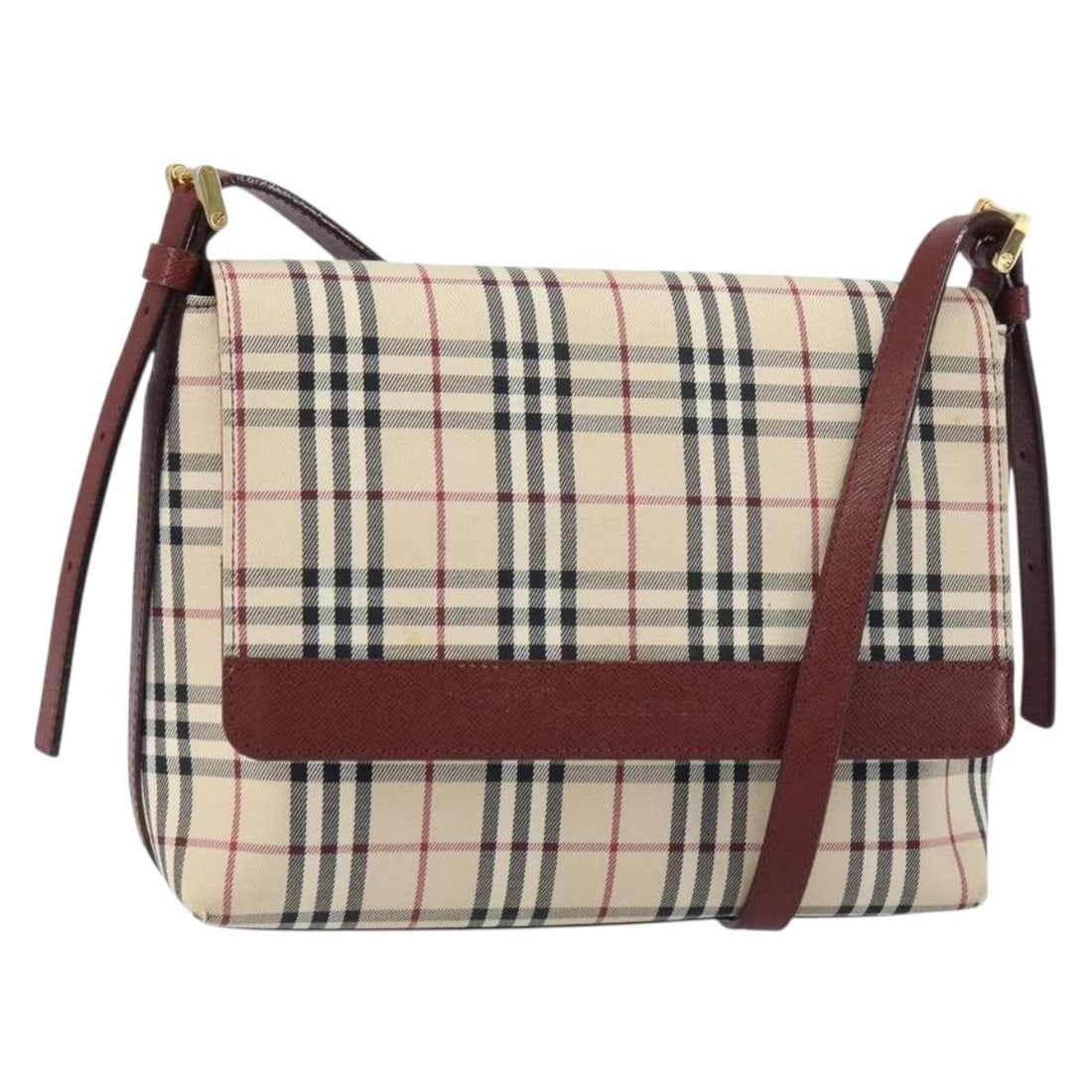 Beige and Gold Canvas Shoulder Bag by Burberry Nova Check Italy: Beige and Gold Canvas Shoulder Bag by Burberry Nova Check Italy This is a Burberry Nova Check shoulder bag crafted from beige and gold canvas. The bag features a structured silhouette with an adjustab