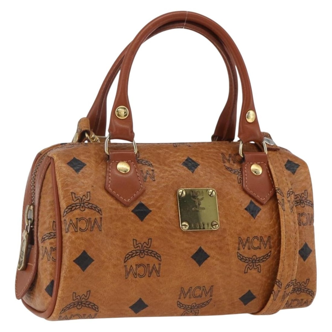 MCM Mini Boston Bag Brown PVC Leather Logogram with Shoulder Strap: MCM Mini Boston Bag Brown PVC Leather Logogram with Shoulder Strap This MCM Vicetos Logogram Mini Boston Bag offers a compact and versatile style crafted from PVC leather in brown and gold tones. Desi