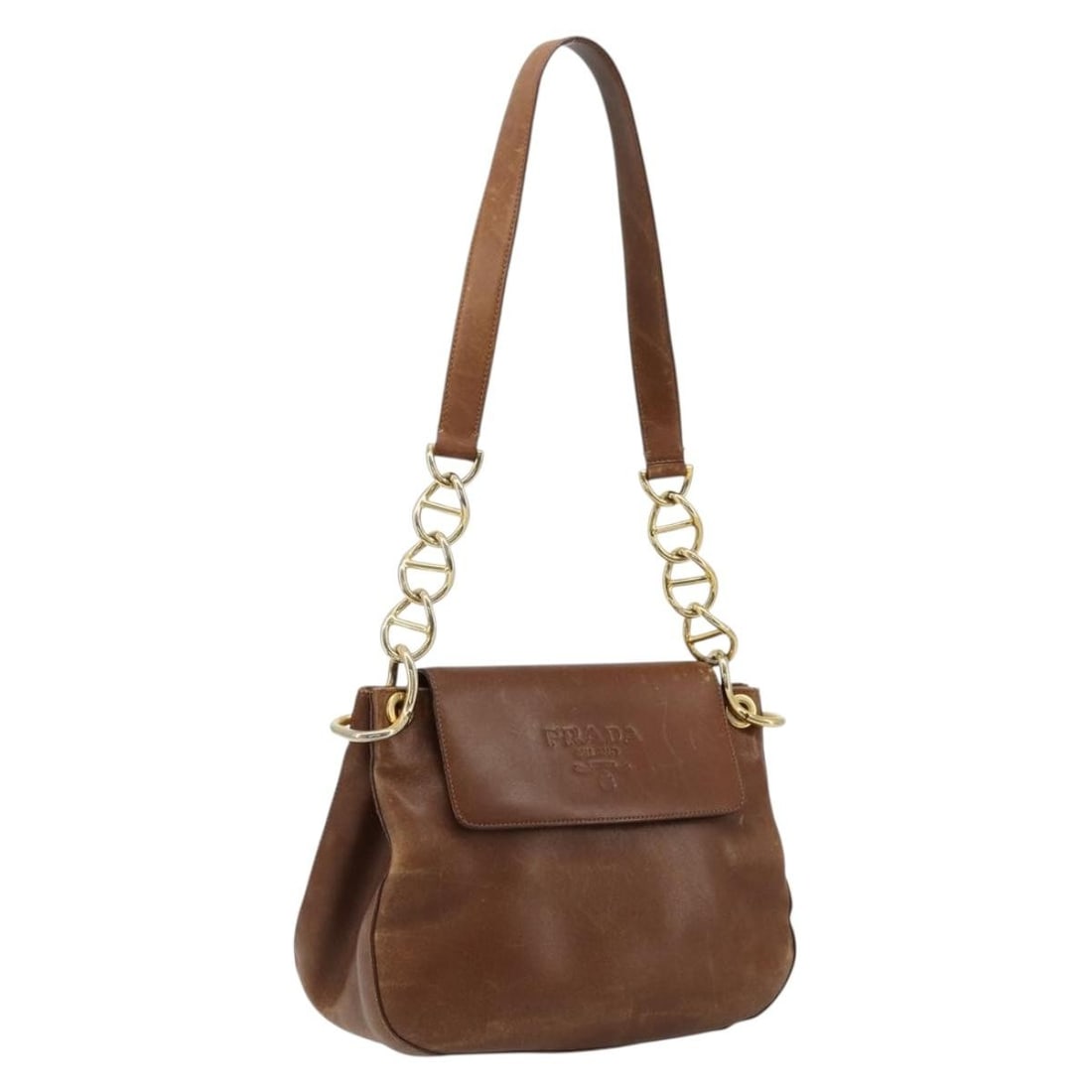 Prada brown leather shoulder bag Italy 10.6 x 7.9 x 4.7 inch: Prada brown leather shoulder bag Italy 10.6 x 7.9 x 4.7 inch This PRADA shoulder bag is crafted from brown and gold leather and features a classic silhouette. Designed for women, it offers a spacious 