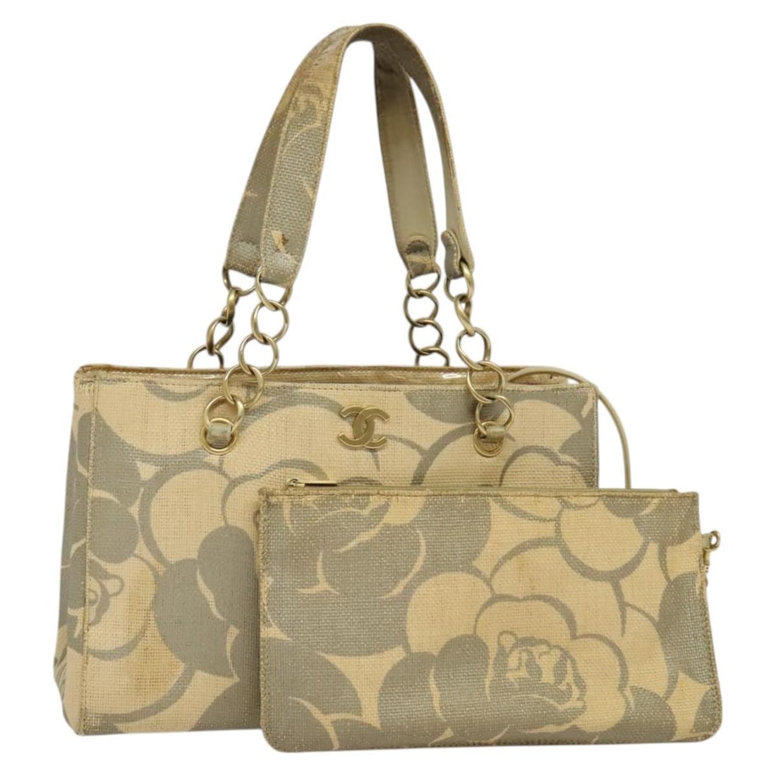 CHANEL Camelia Beige Leather Chain Tote with Pouch: CHANEL Camelia Beige Leather Chain Tote with Pouch Beige Chanel Camelia chain tote bag for women, made in Italy and accompanied by a pouch. This heavily used bag shows visible wear throughout, includi